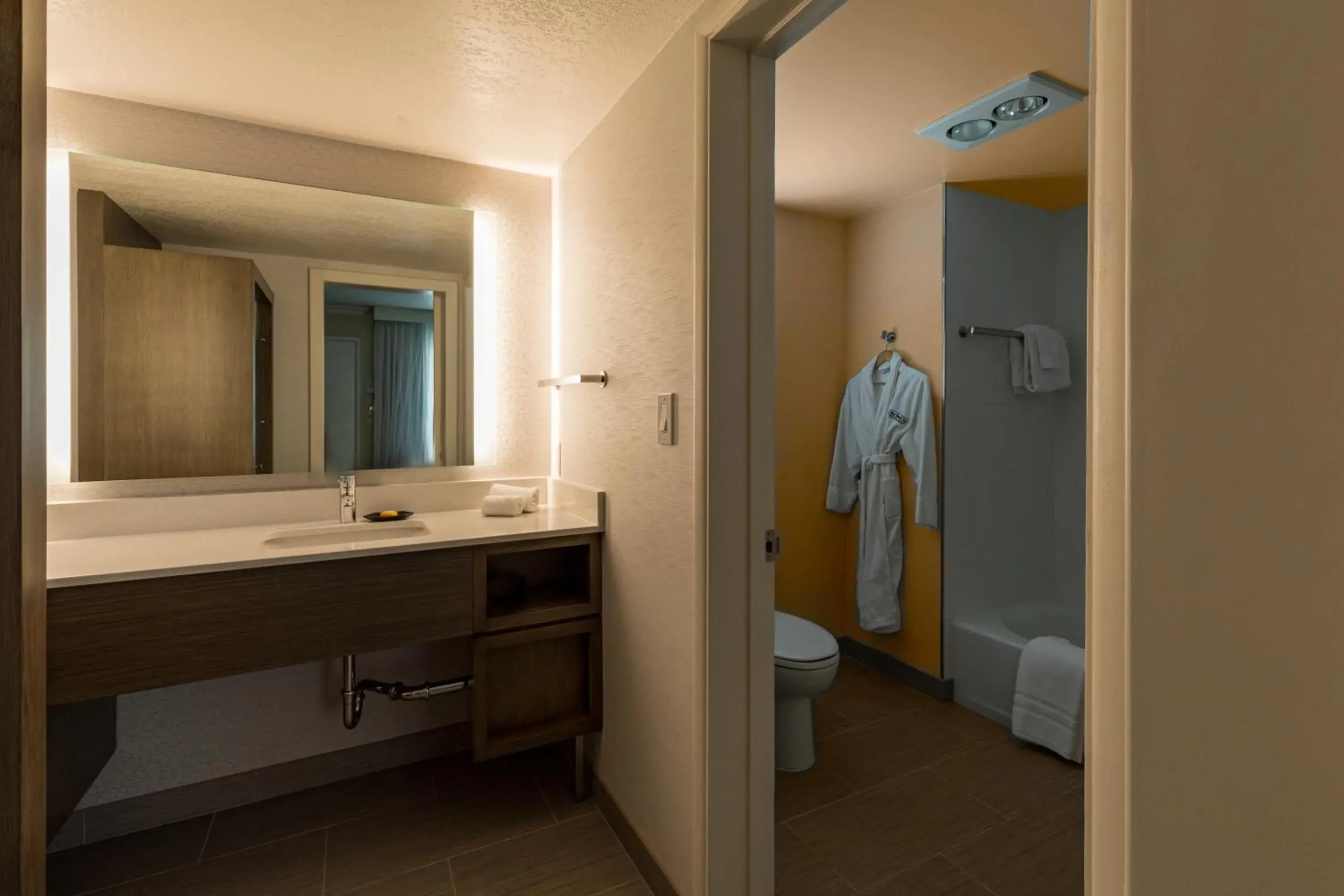 Bathroom in West Beach Inn, a Coast Hotel