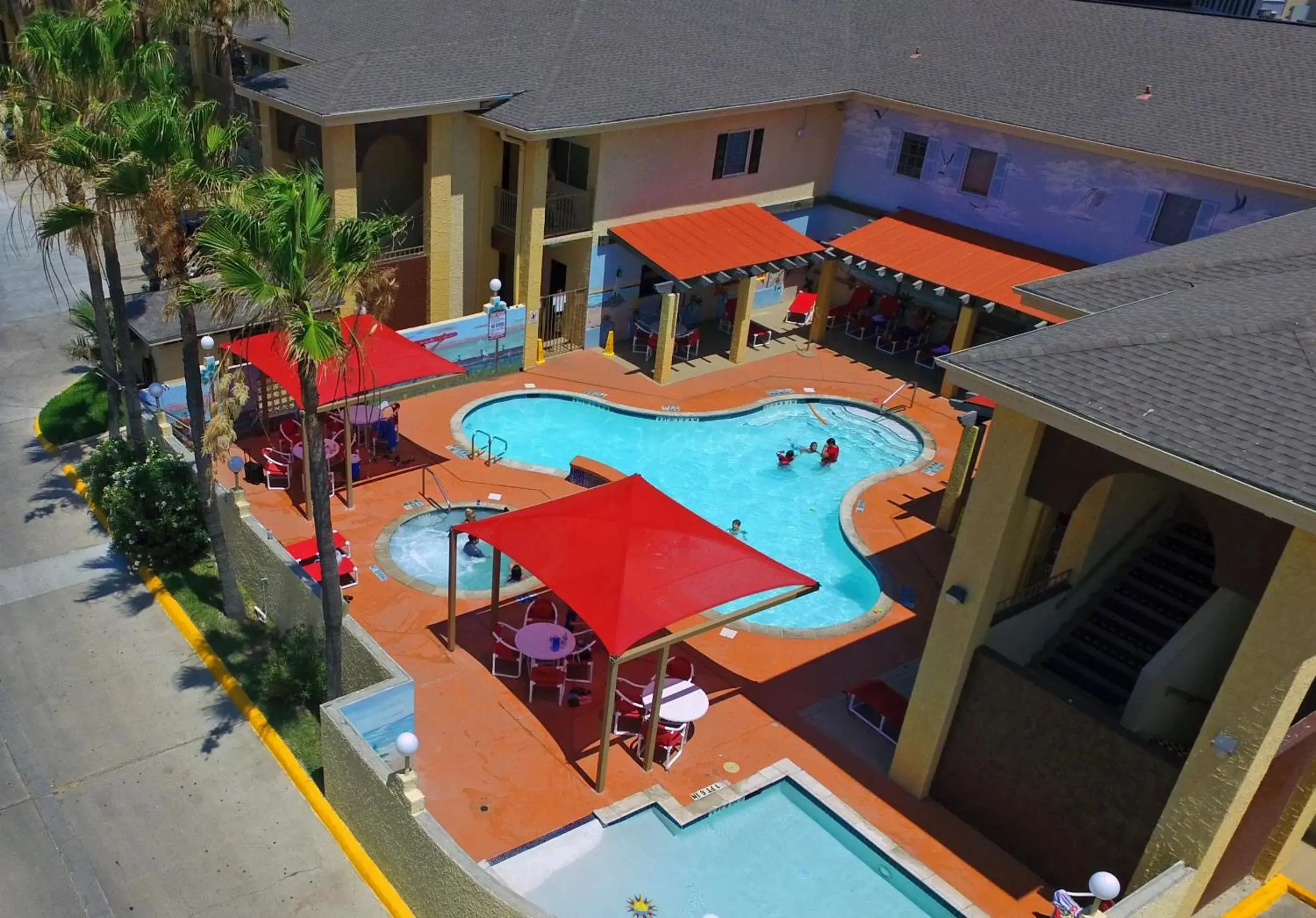 Swimming pool, Pool View in Ramada by Wyndham & Suites South Padre Island