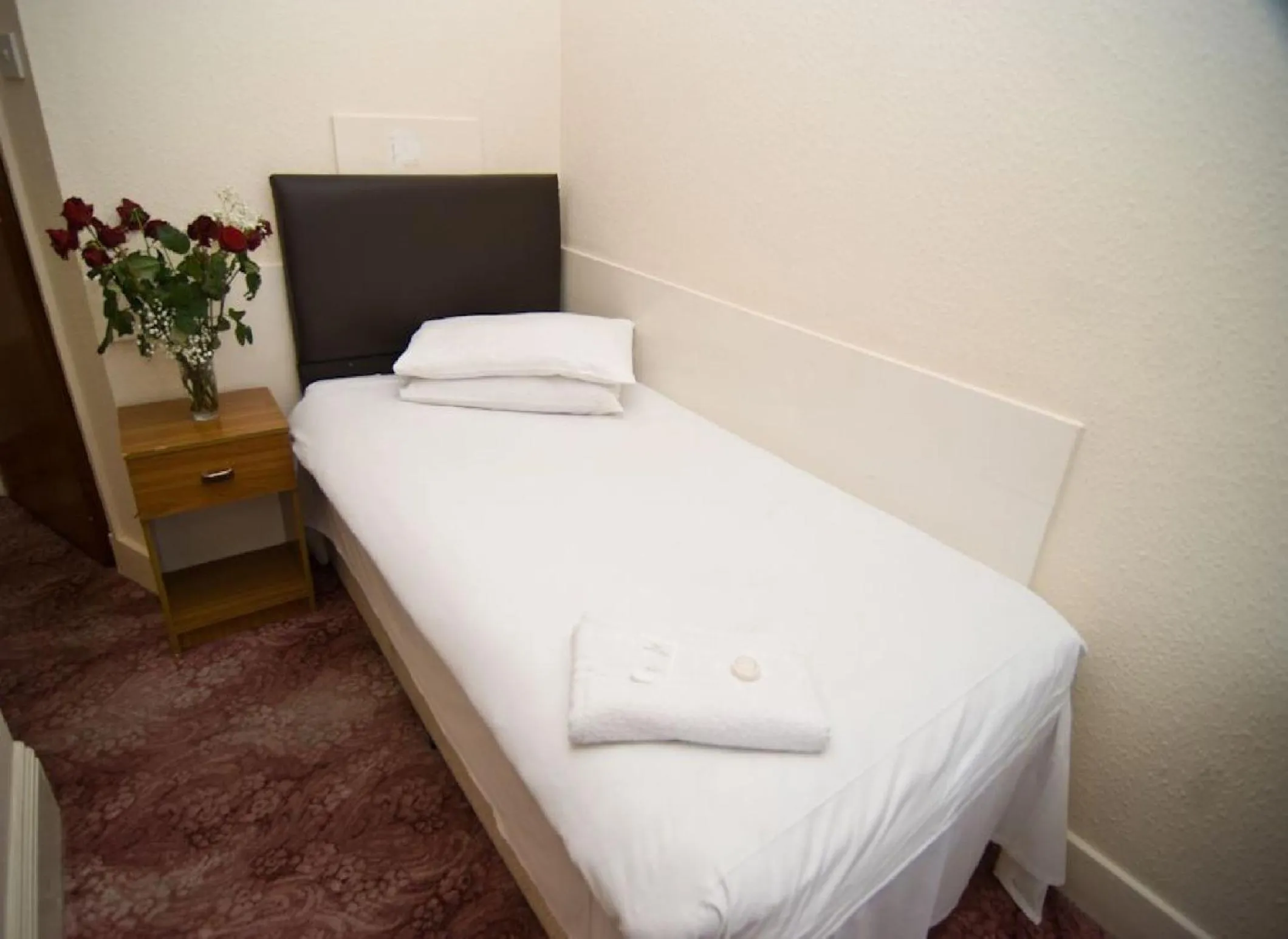 Bed in Charlie Hotel