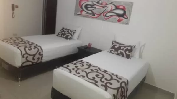 Bedroom, Bed in Hotel Cafe Plaza