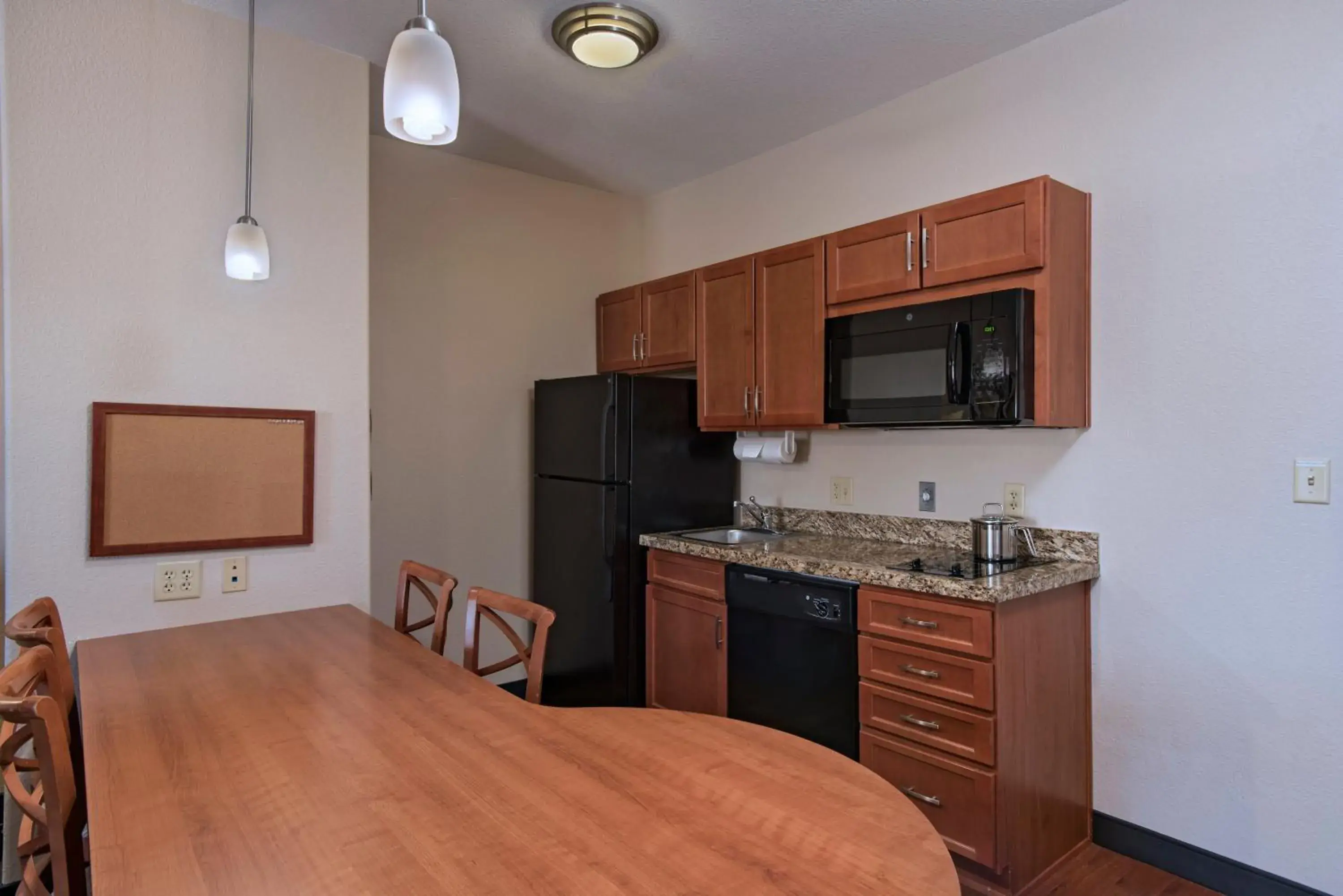 Photo of the whole room, Kitchen/Kitchenette in Candlewood Suites Austin North-Cedar Park, an IHG Hotel