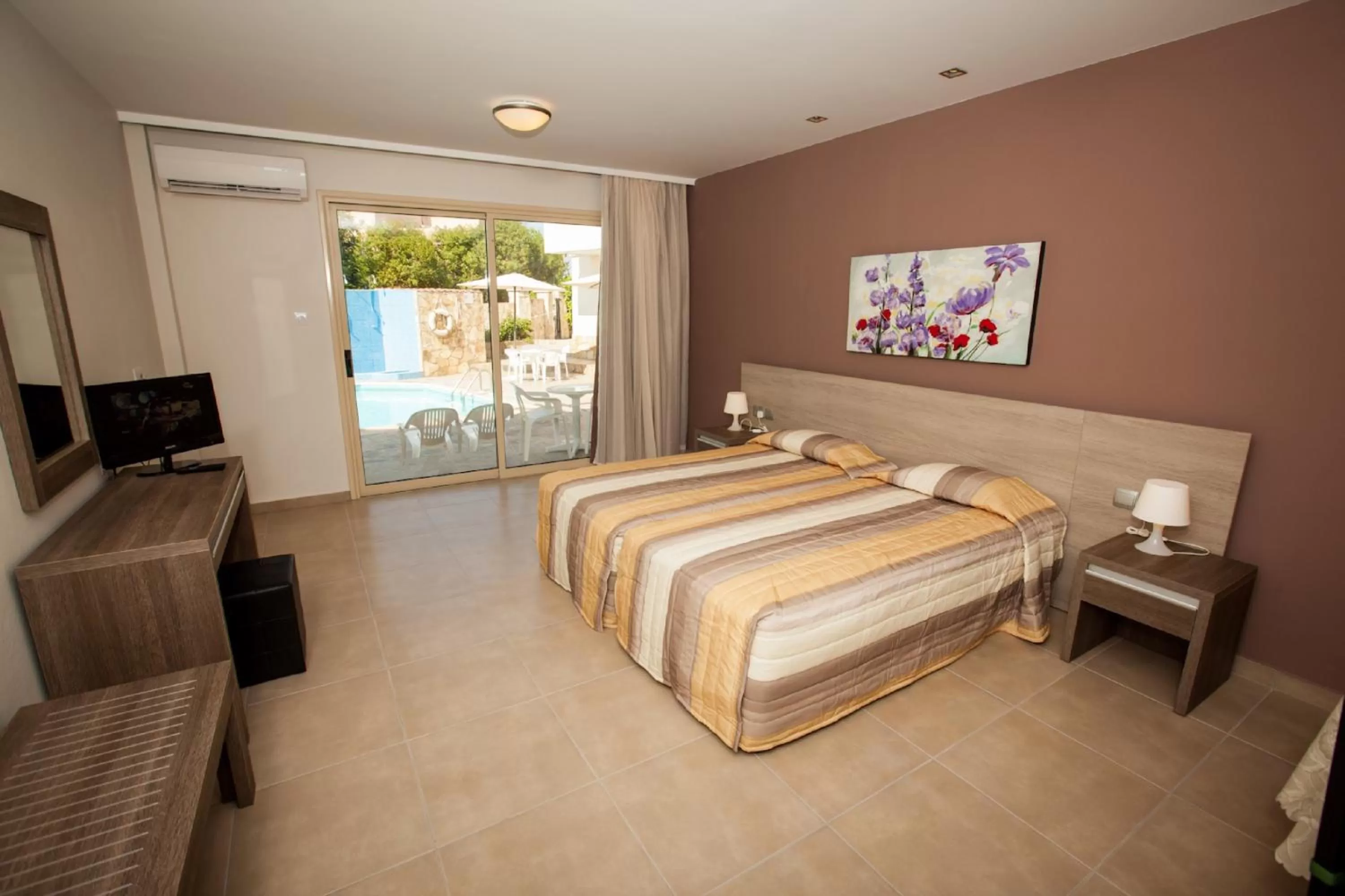 Bed in Crystallo Apartments