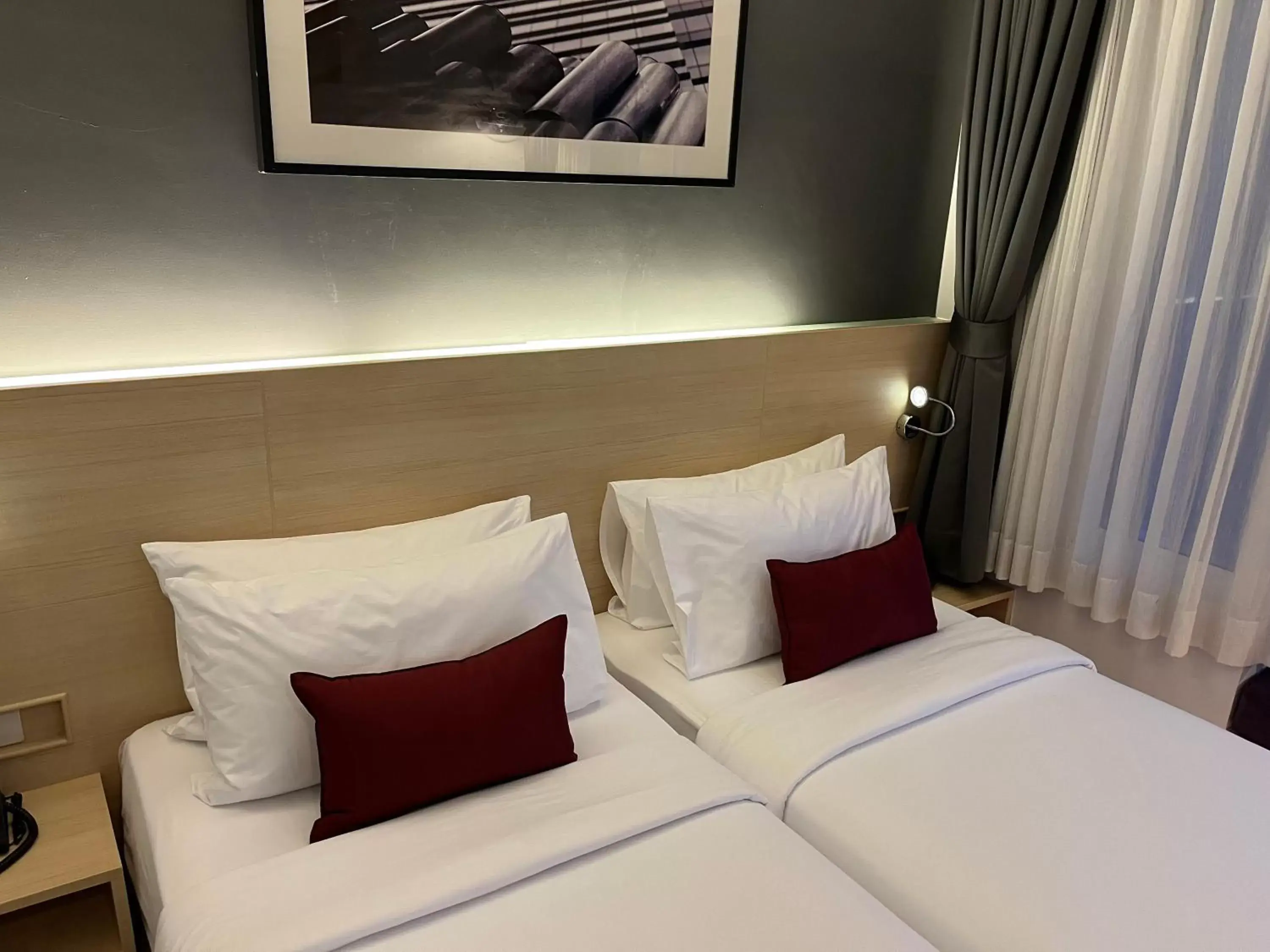 Bed in Arize Hotel Sukhumvit