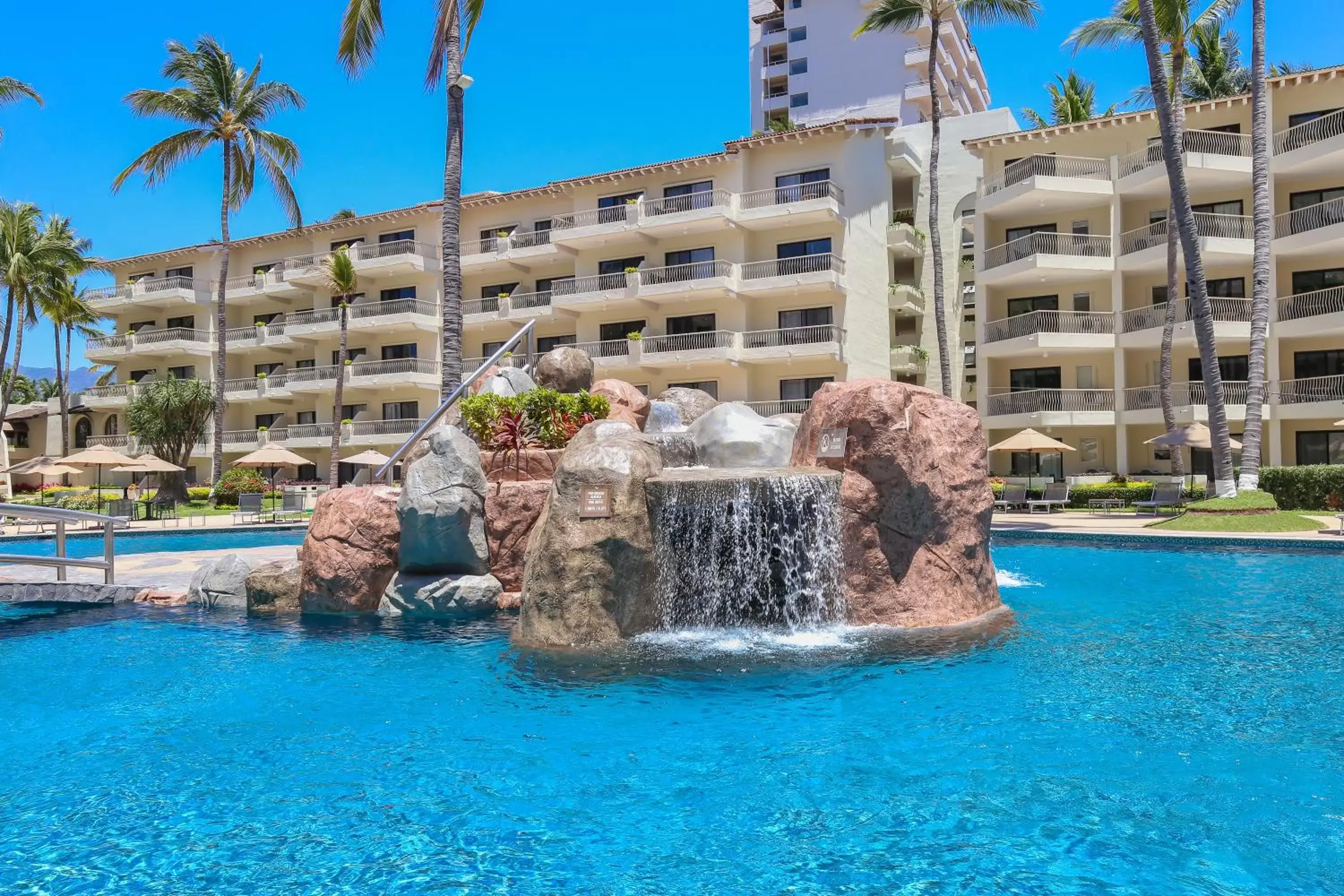 Swimming pool, Property Building in Villa del Palmar Beach Resort & Spa Puerto Vallarta