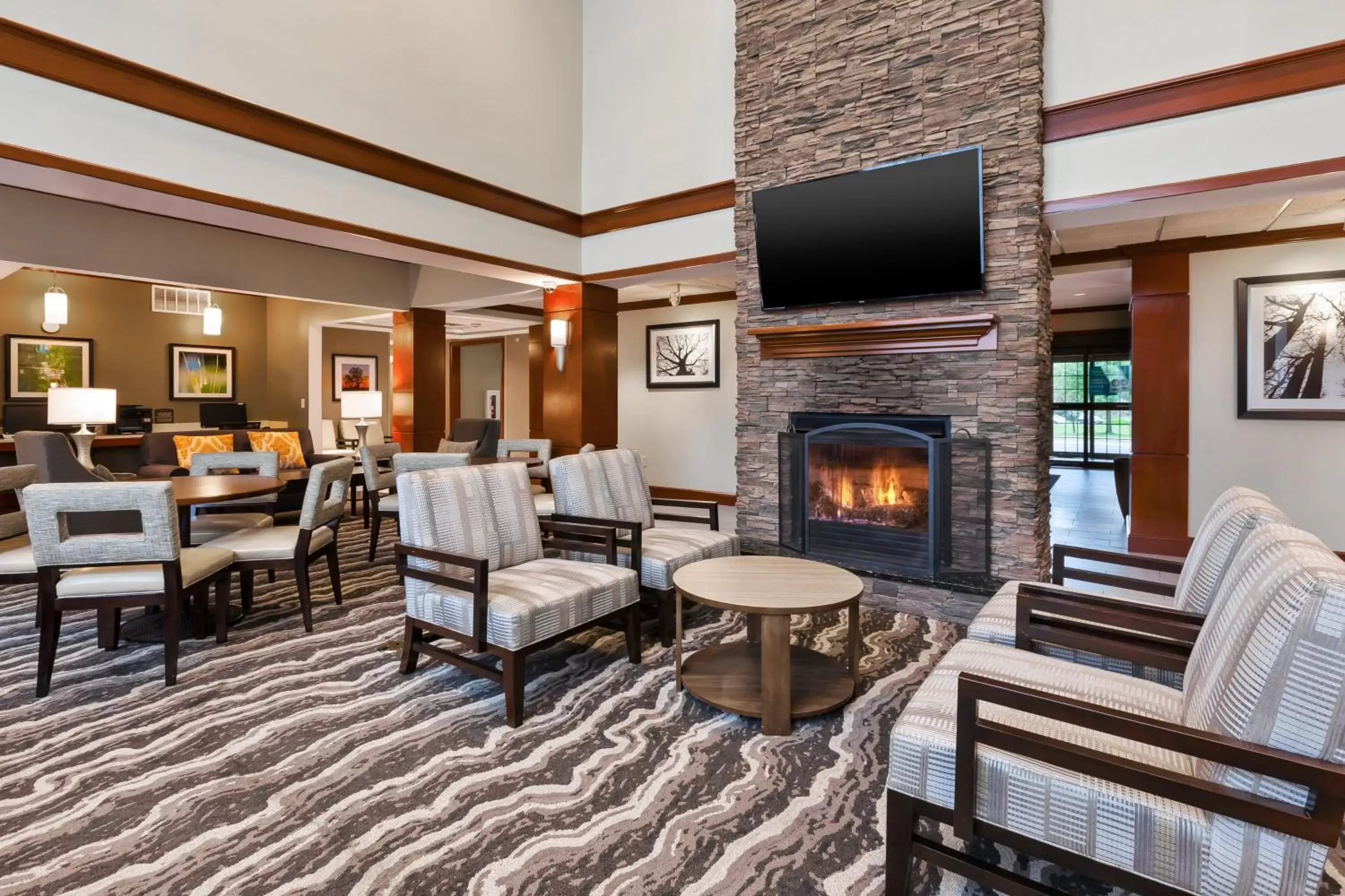 Lobby or reception, Seating Area in Staybridge Suites Kalamazoo, an IHG Hotel