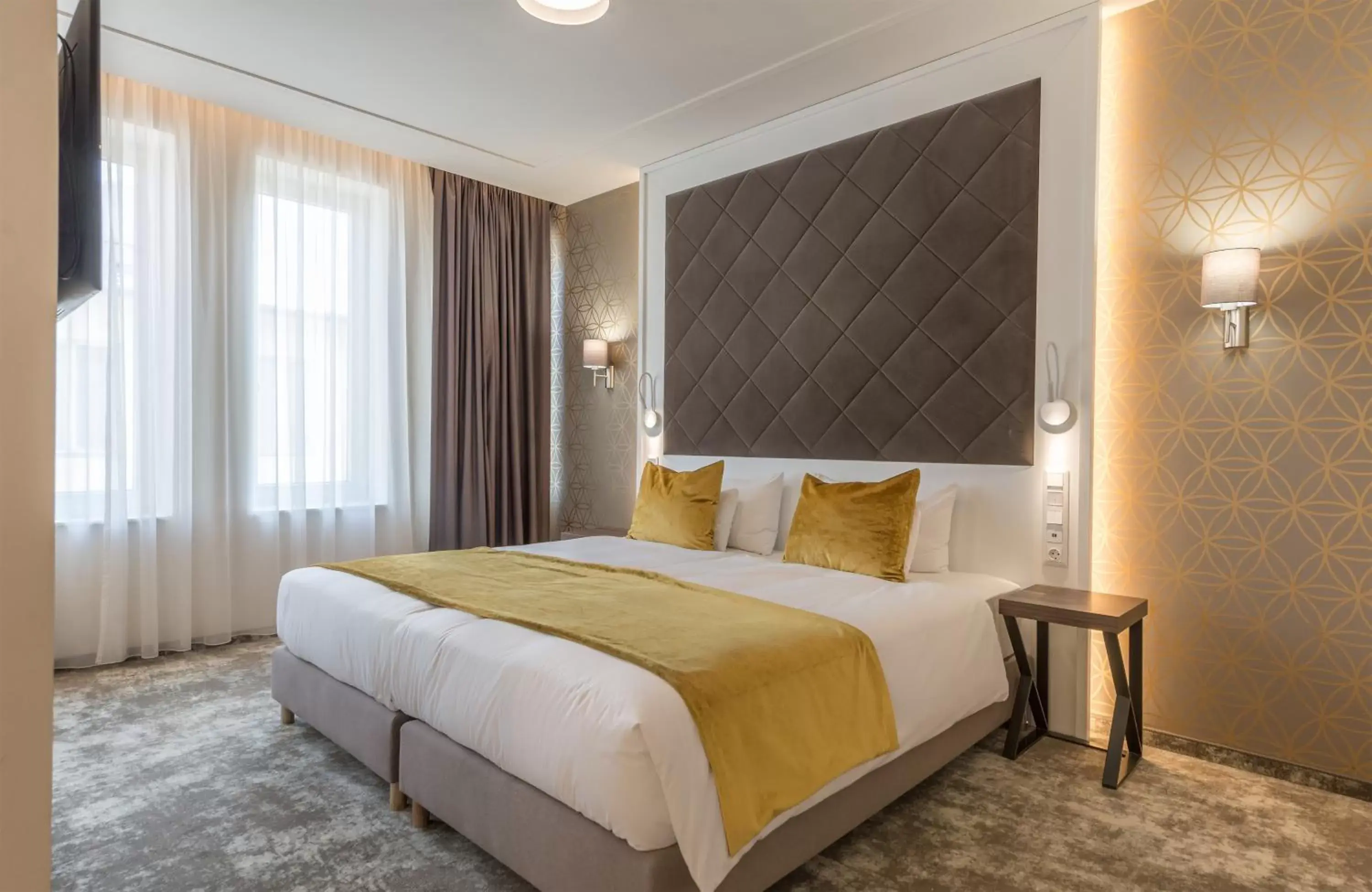 Bed in Leonardo Boutique Hotel Budapest M-Square