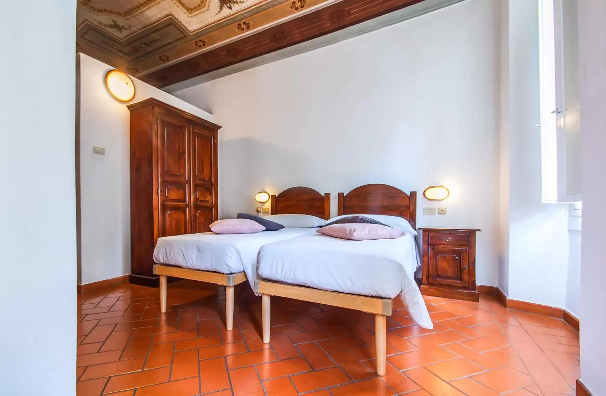 Bed in Hotel Costantini