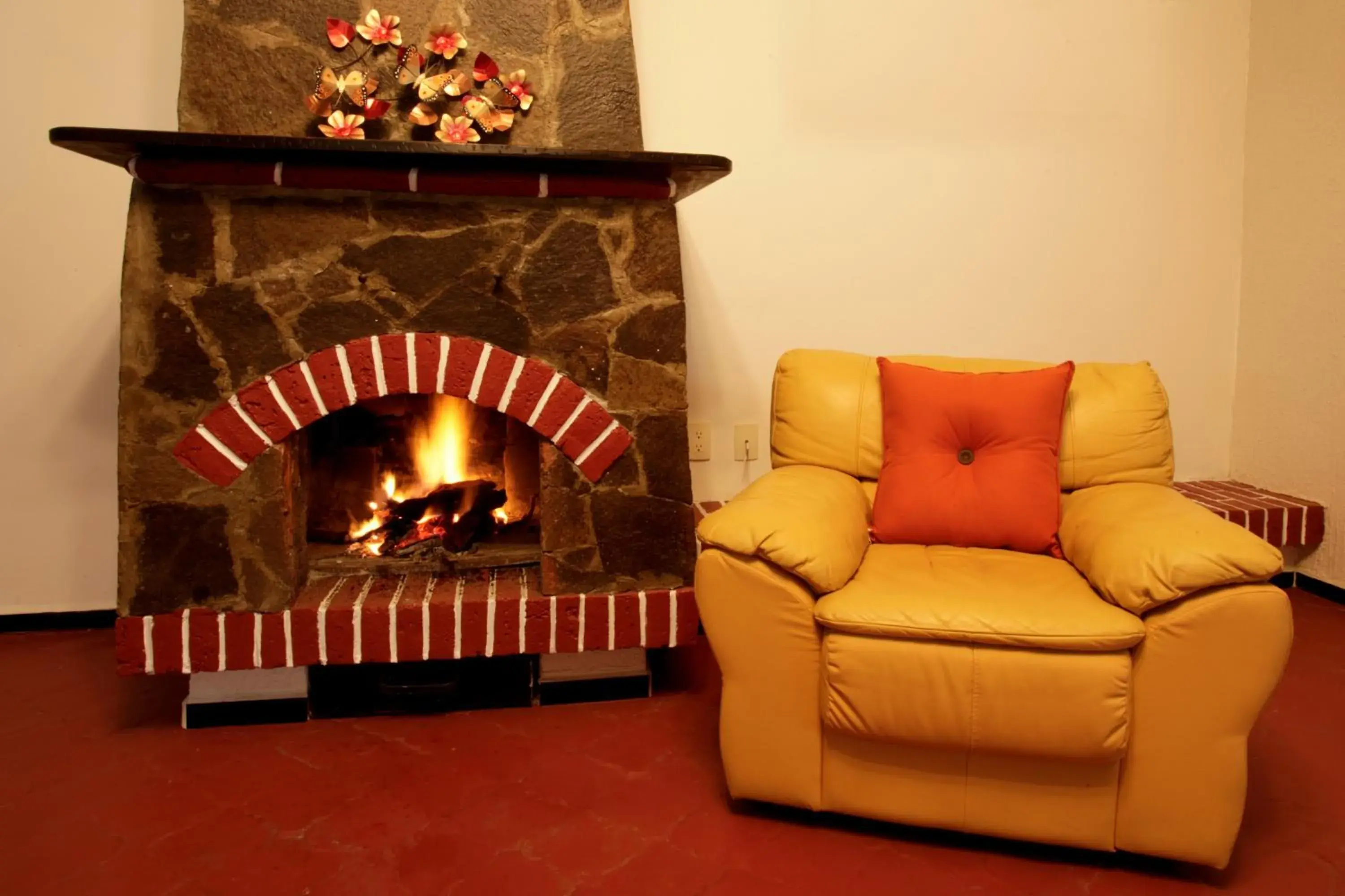 Communal lounge/ TV room, Seating Area in Hotel Finca Las Hortensias