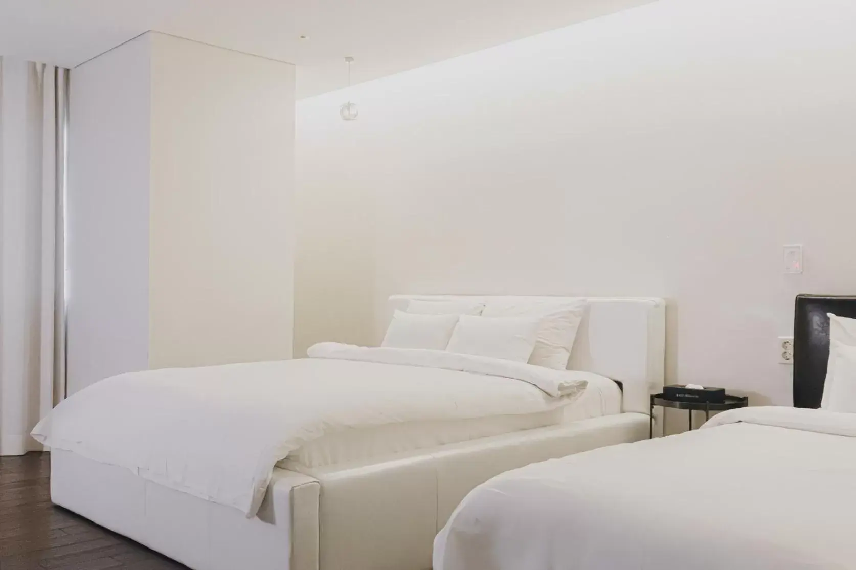 Bed in ACC Design Hotel