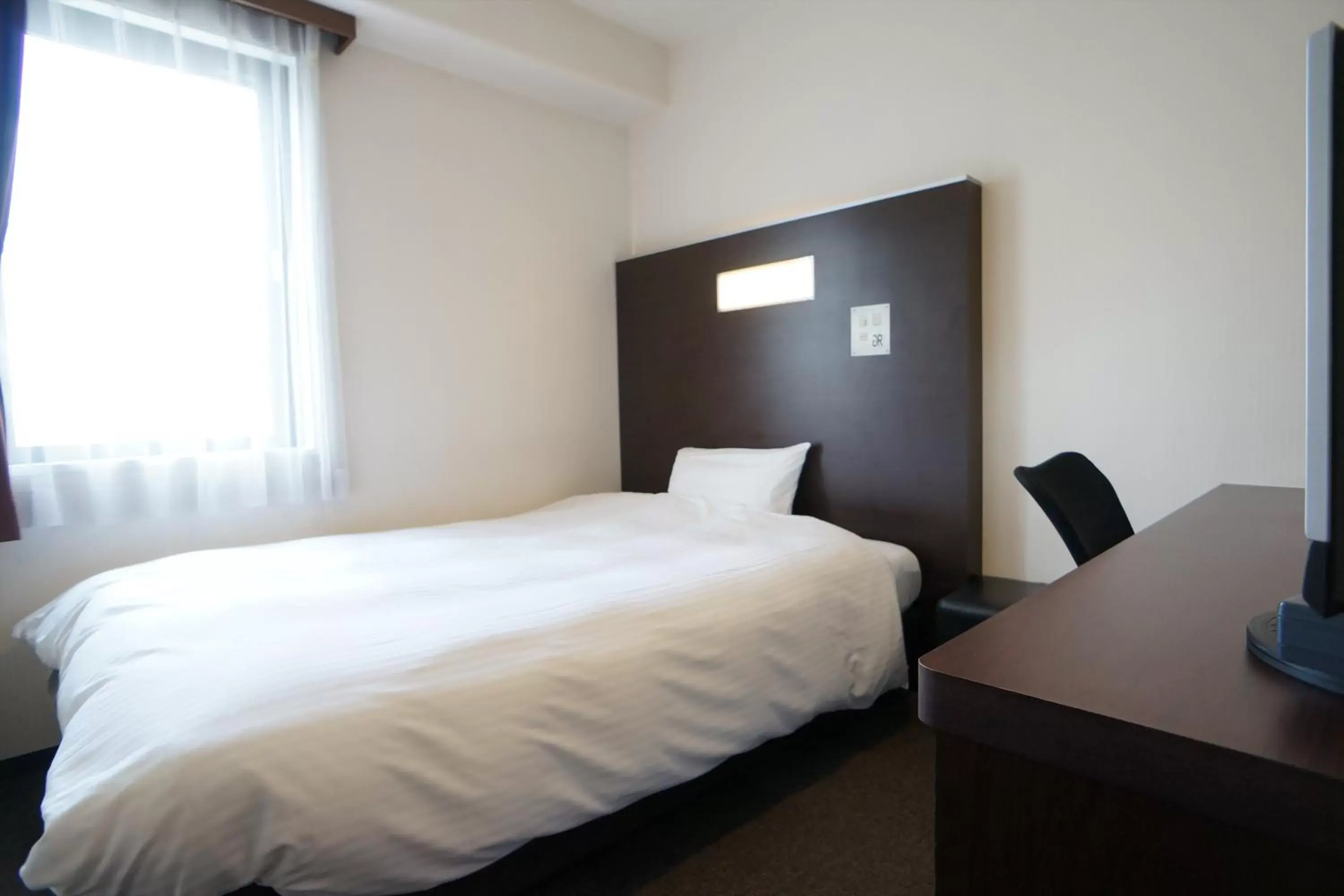 Photo of the whole room, Bed in Green Rich Hotel Hiroshima Shinkansenguchi (Artificial hot spring Futamata Yunohana)