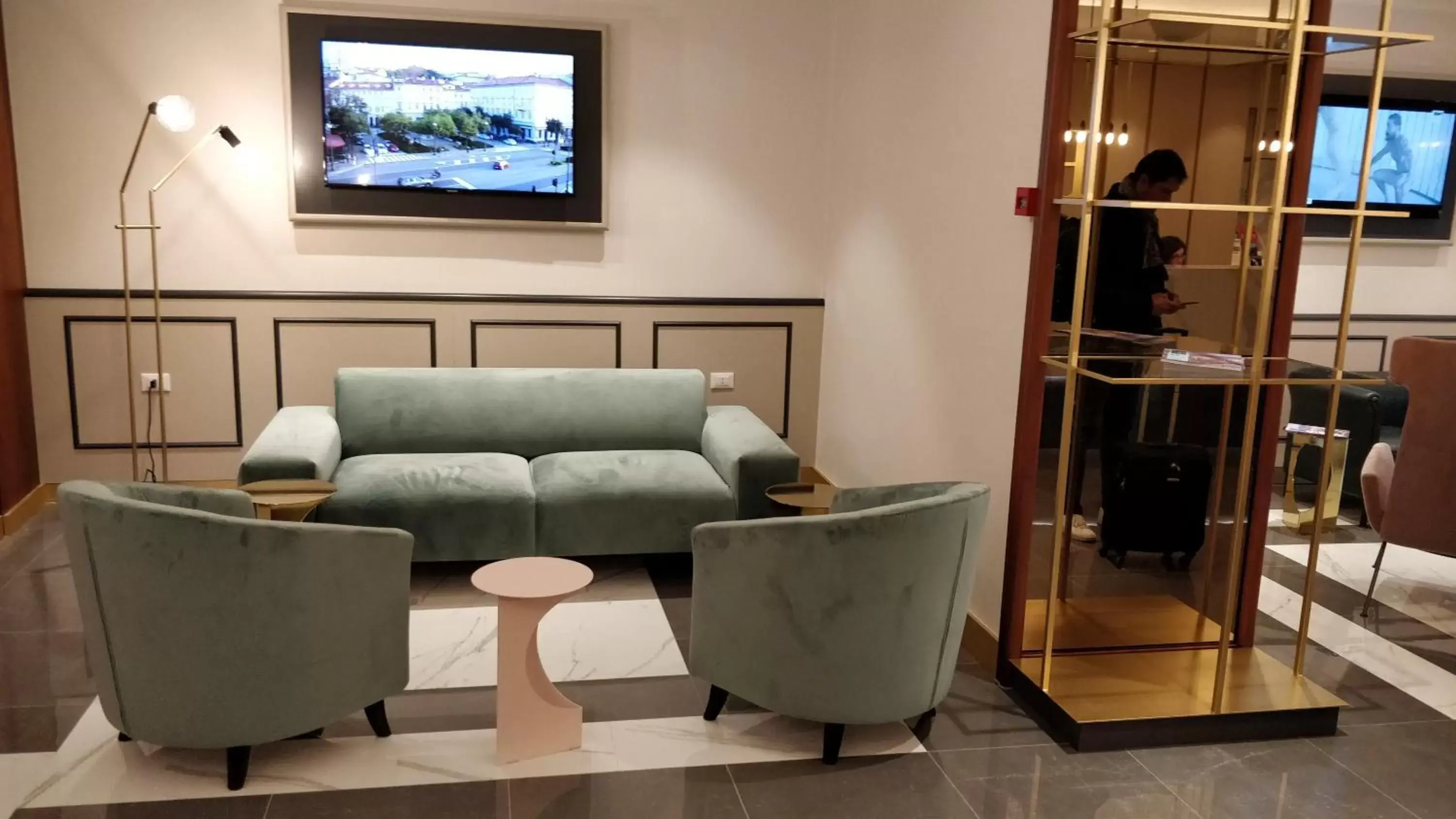 Communal lounge/ TV room, Seating Area in Hotel Roma