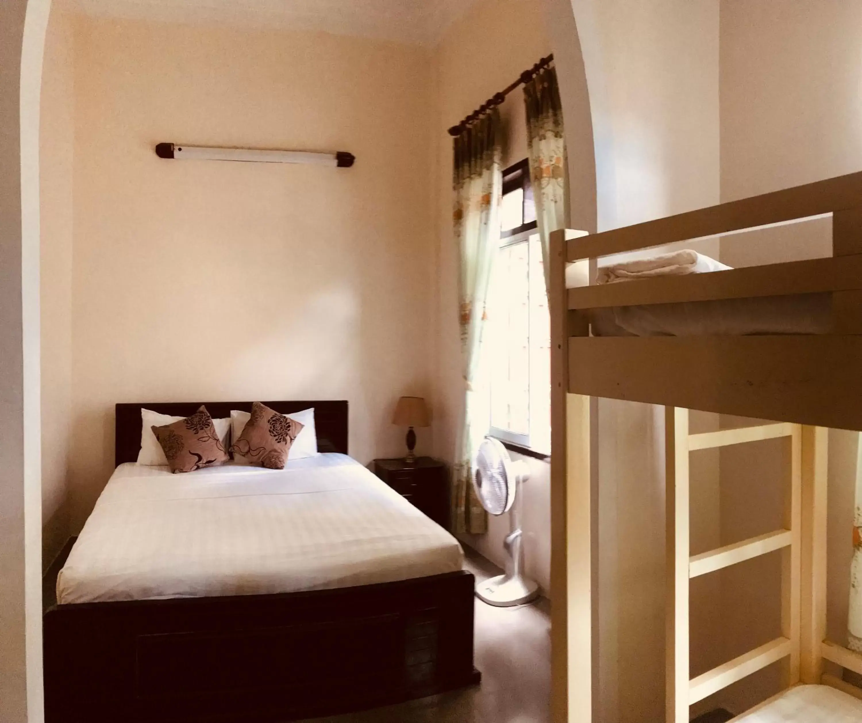 Bed in Nam Long Hotel Bed in Nam Long Hotel