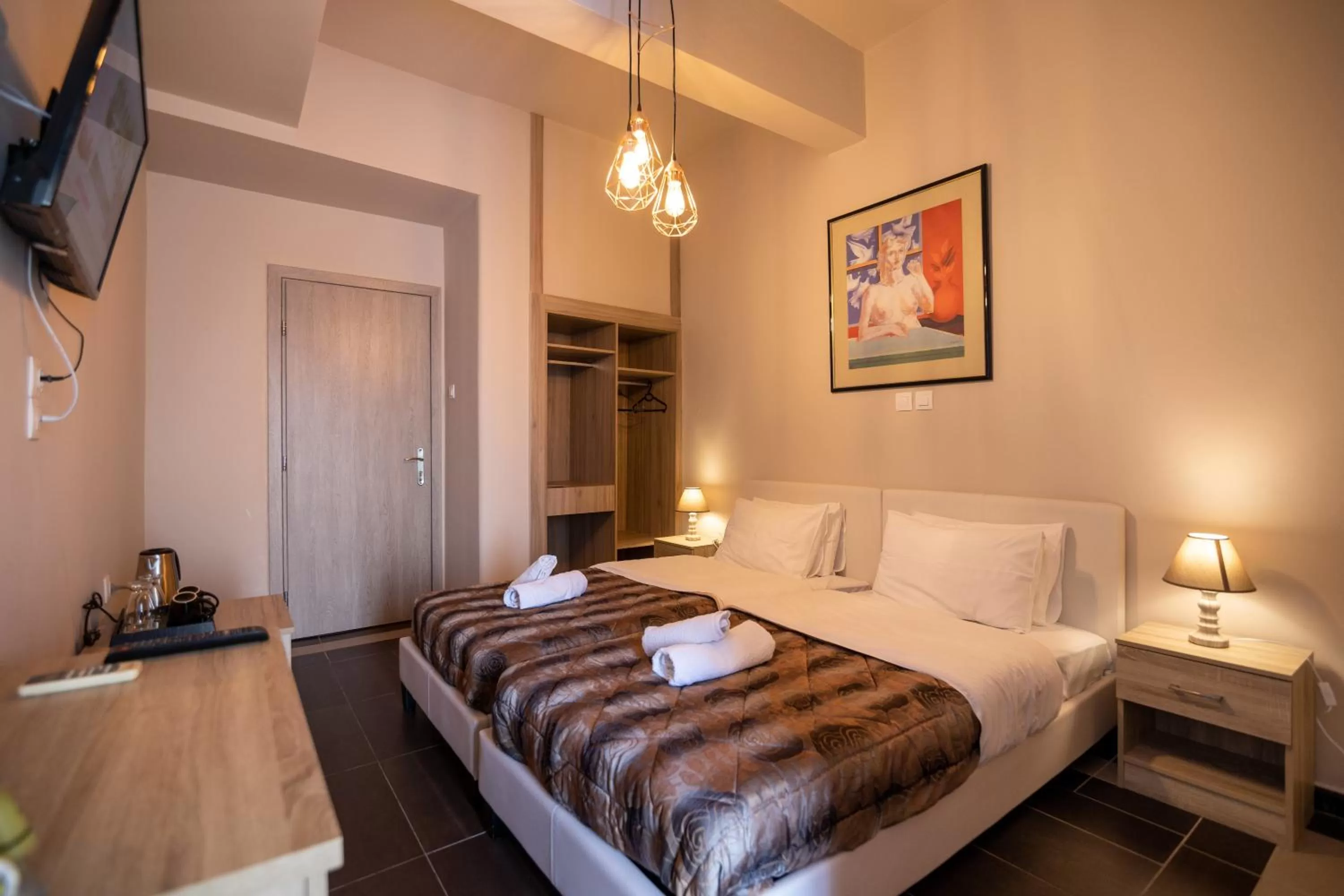 Bed in Votsalakia Hotel & Luxury Apartments