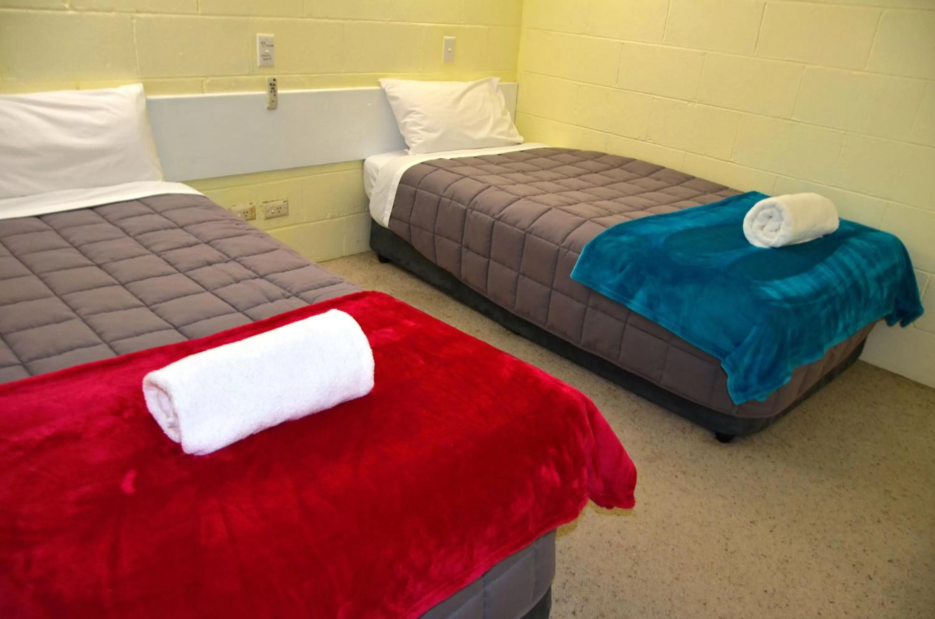 Bed in Charles Sturt Motor Inn