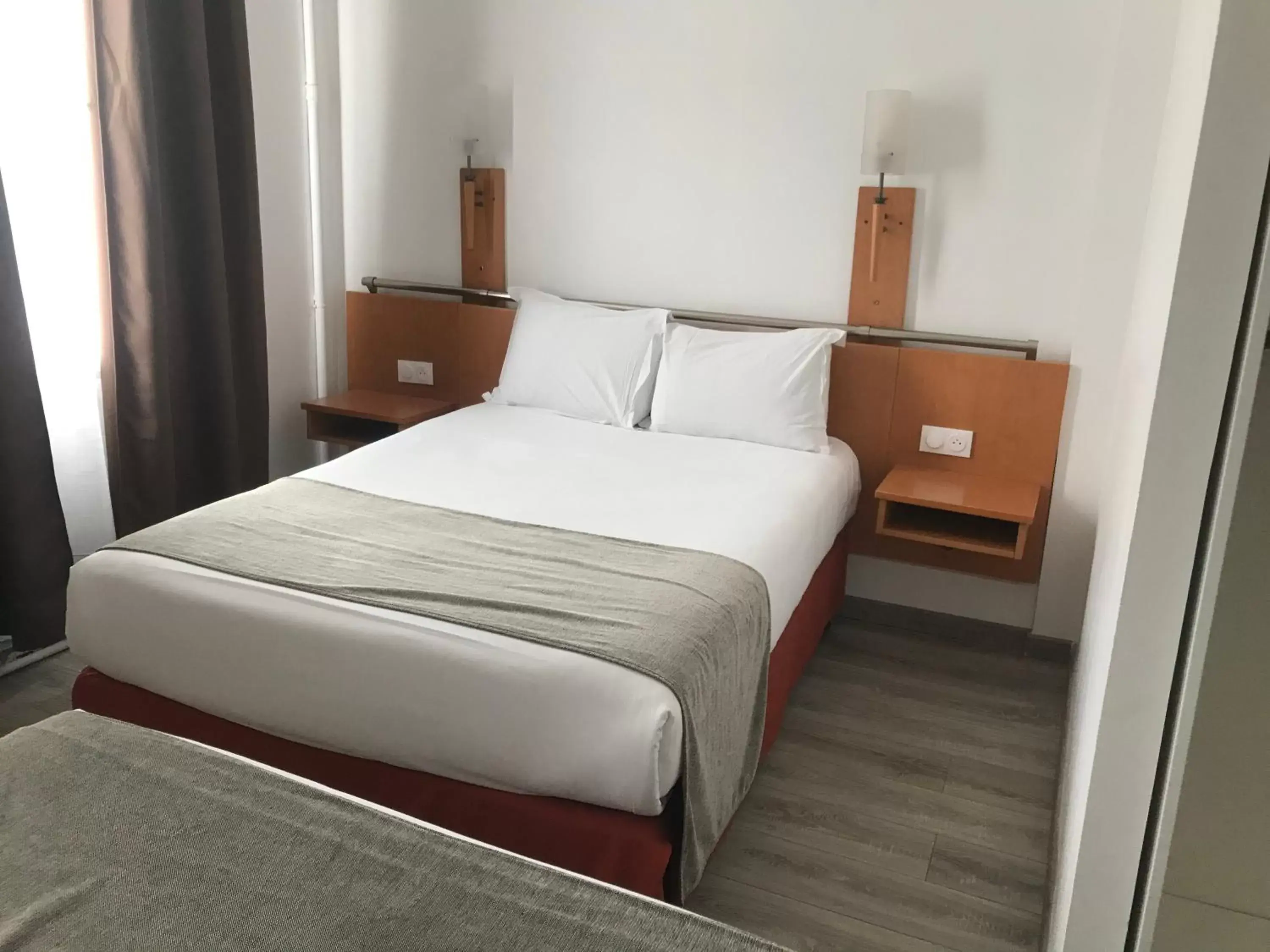 Bed in Hotel Morand