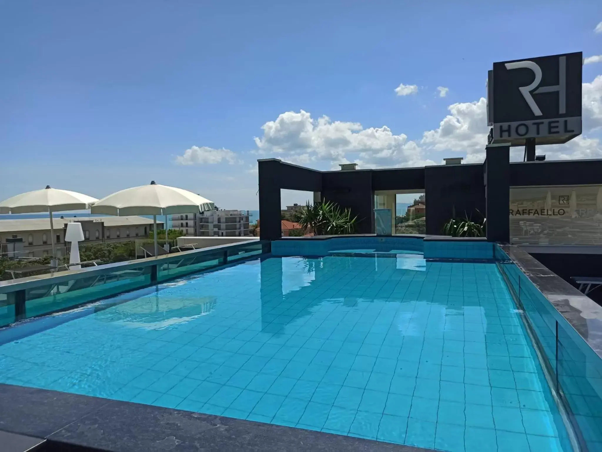 Balcony/Terrace, Swimming Pool in Raffaello Hotel