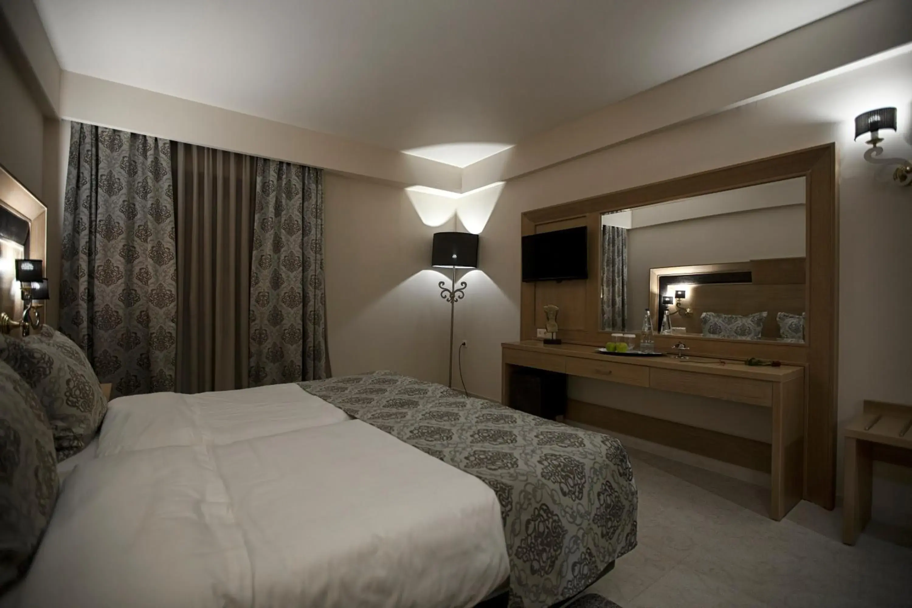 Bed in Grand Meteora Hotel