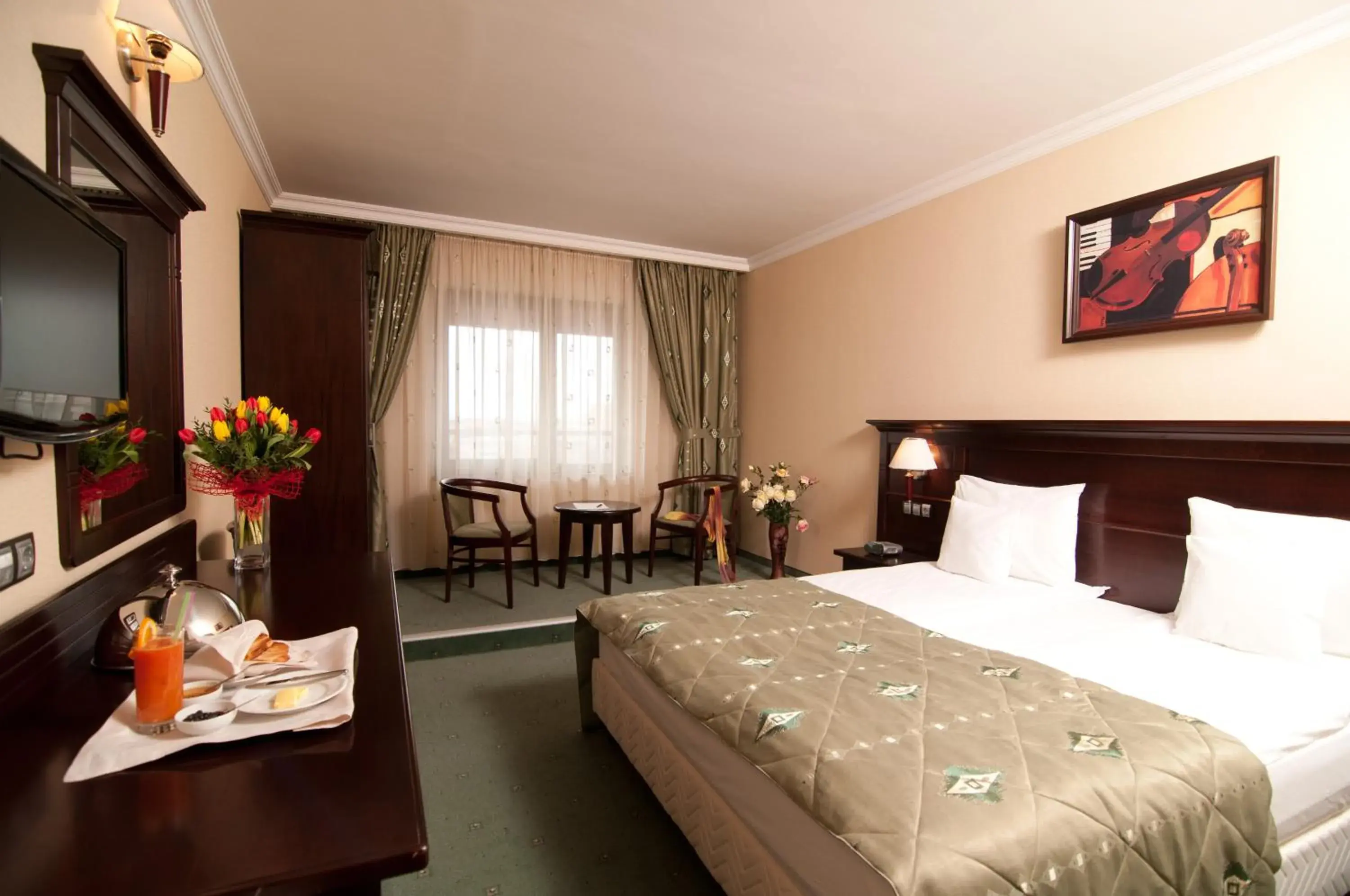 Photo of the whole room, Bed in Hotel Rapsodia City Center
