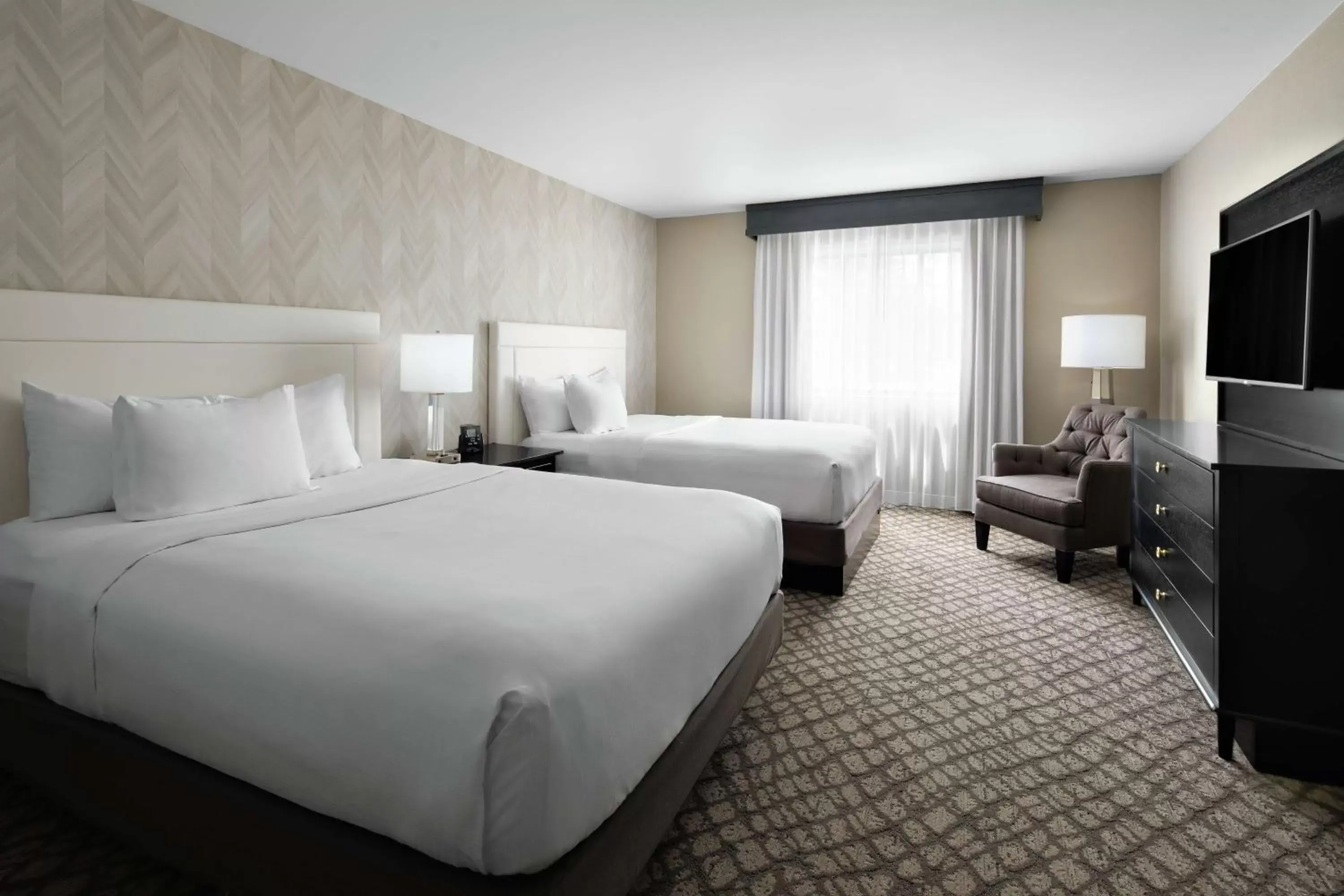 Bed in DoubleTree Suites by Hilton Charlotte/SouthPark