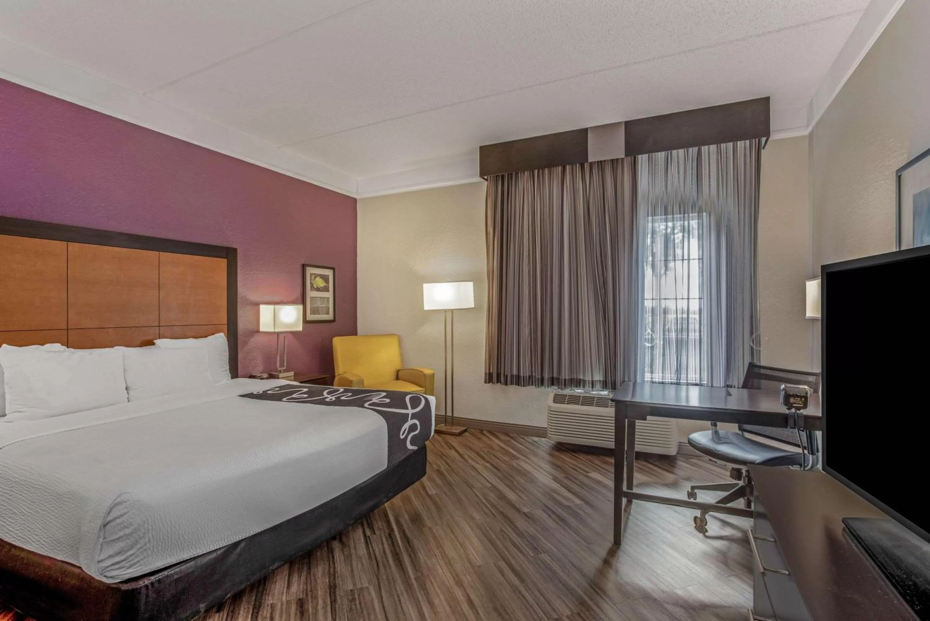 Photo of the whole room, Bed in La Quinta by Wyndham Orlando Airport North - Free Airport Shuttle!