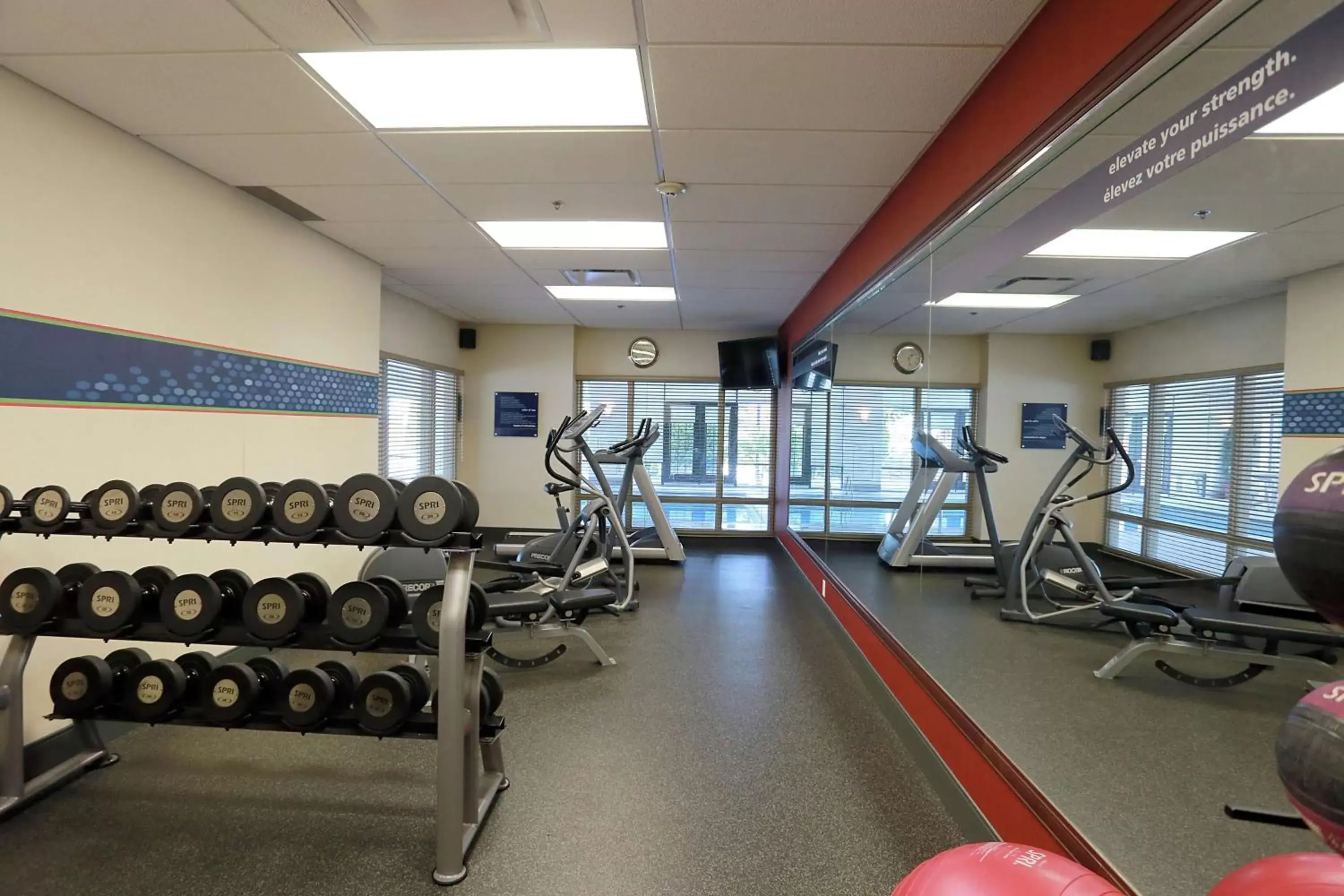 Fitness centre/facilities, Fitness Center/Facilities in Hampton Inn & Suites Laval