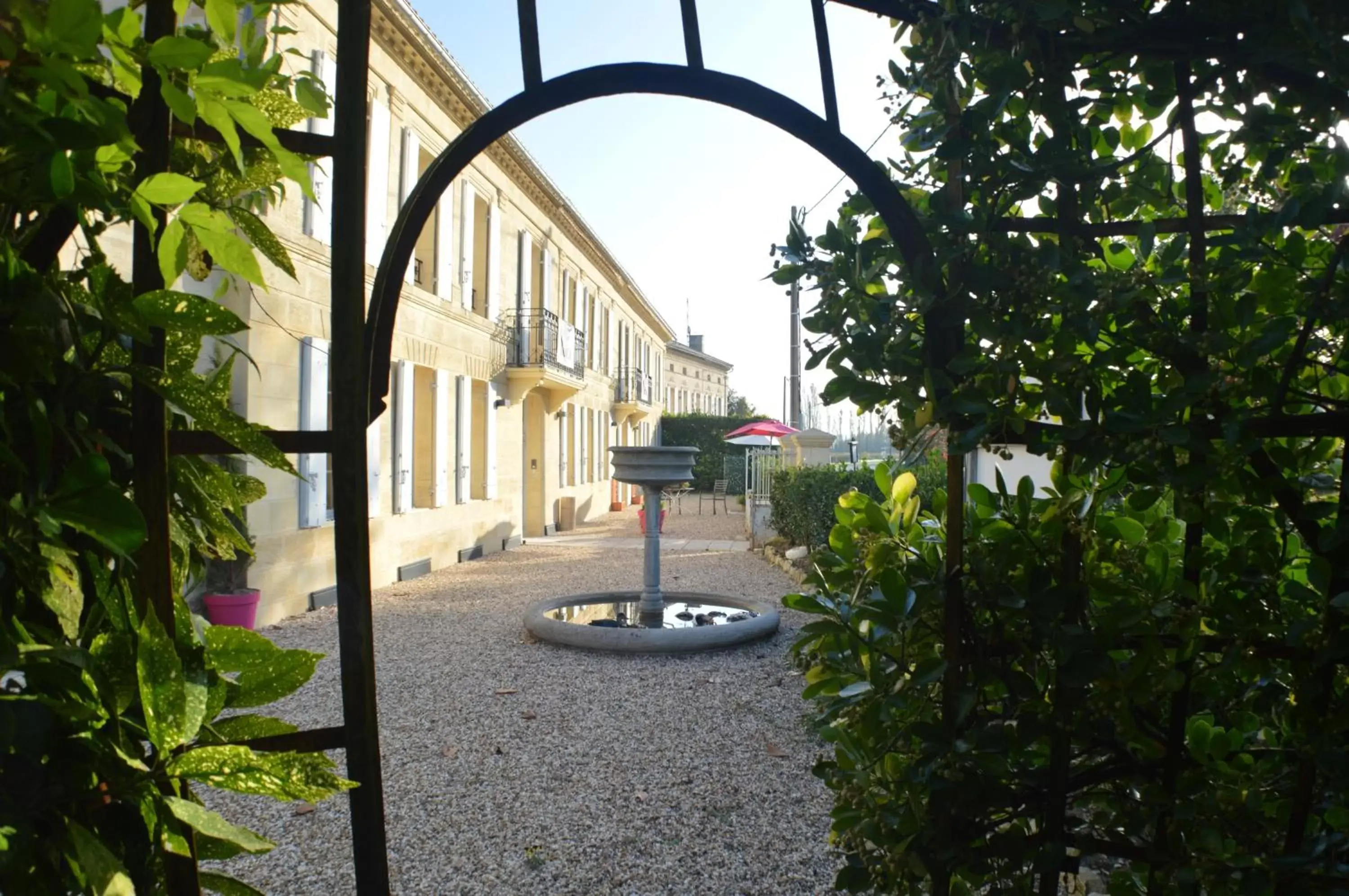 Property building in Logis- Hôtel Spa Restaurant l'Epicurial Property building in Logis- Hôtel Spa Restaurant l'Epicurial