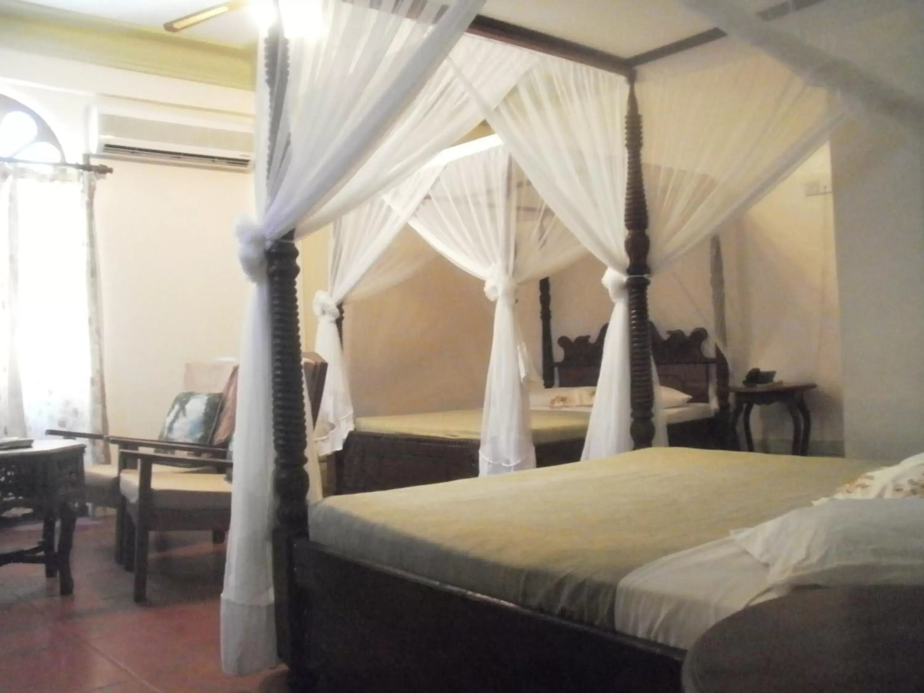 Photo of the whole room, Bed in Asmini Palace Hotel