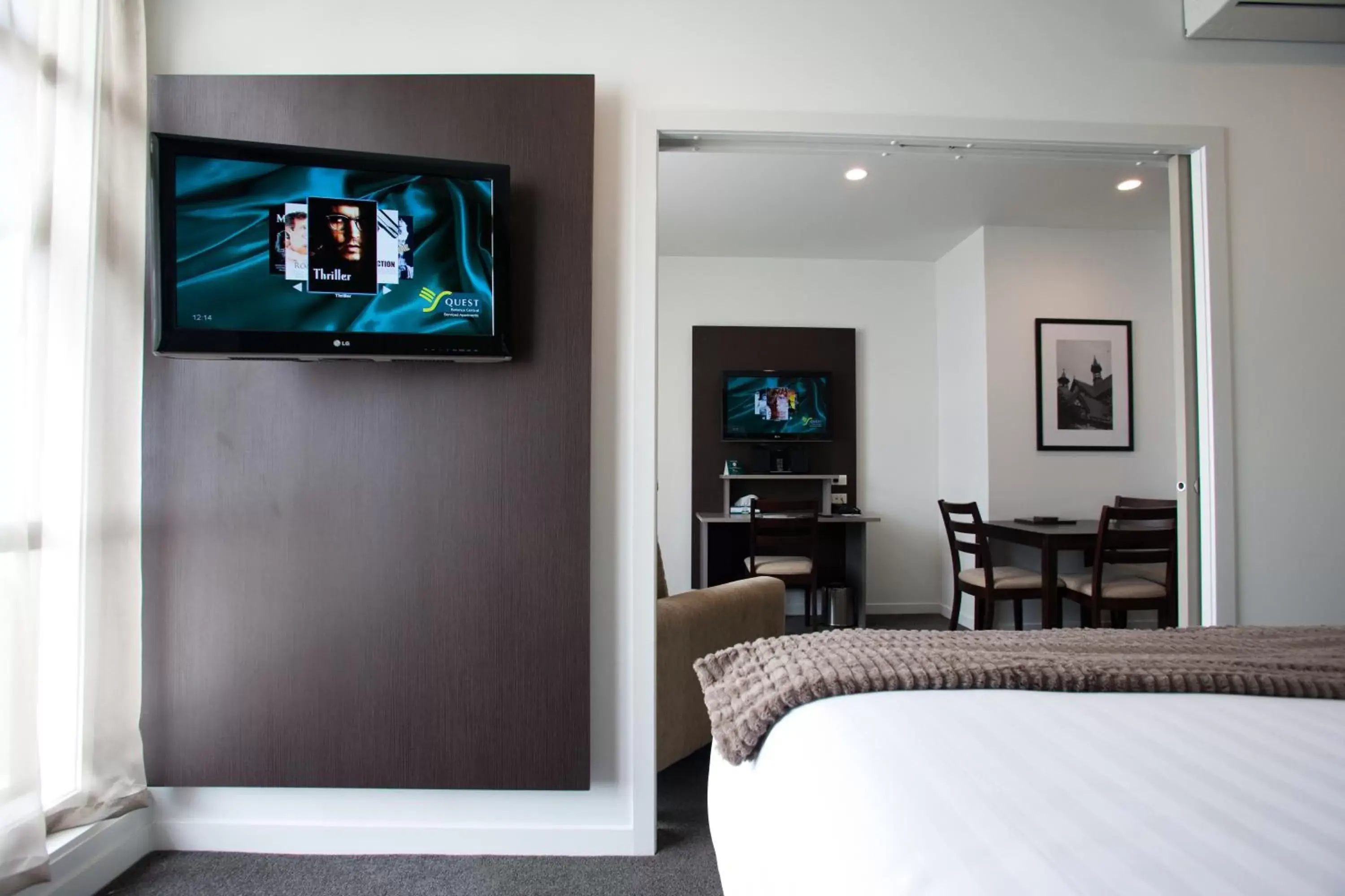 Bed, TV/Entertainment Center in Quest Rotorua Central