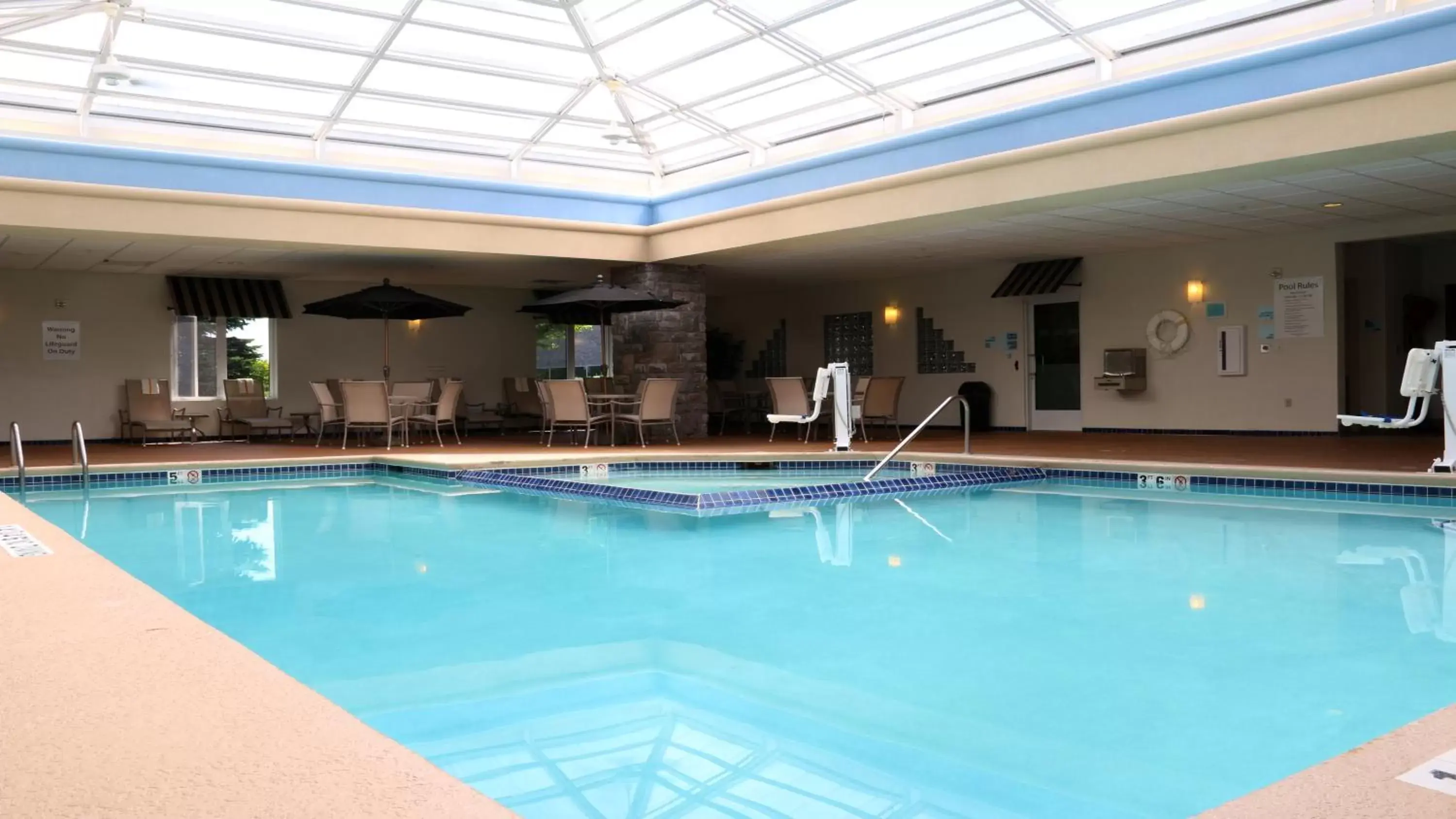 Swimming pool in Holiday Inn Express Hotel & Suites Saginaw, an IHG Hotel