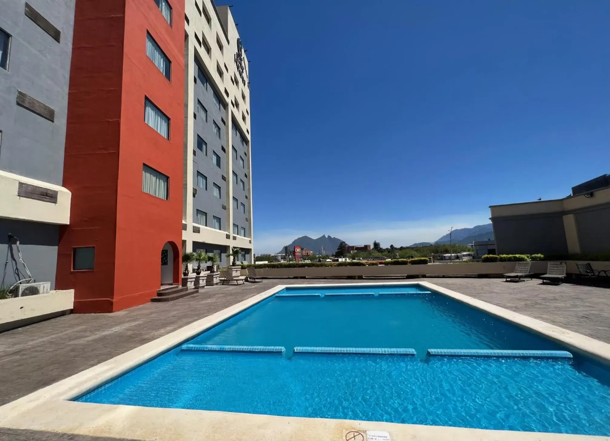 Swimming Pool in CHN Hotel Monterrey Norte, Trademark Collection by Wyndham