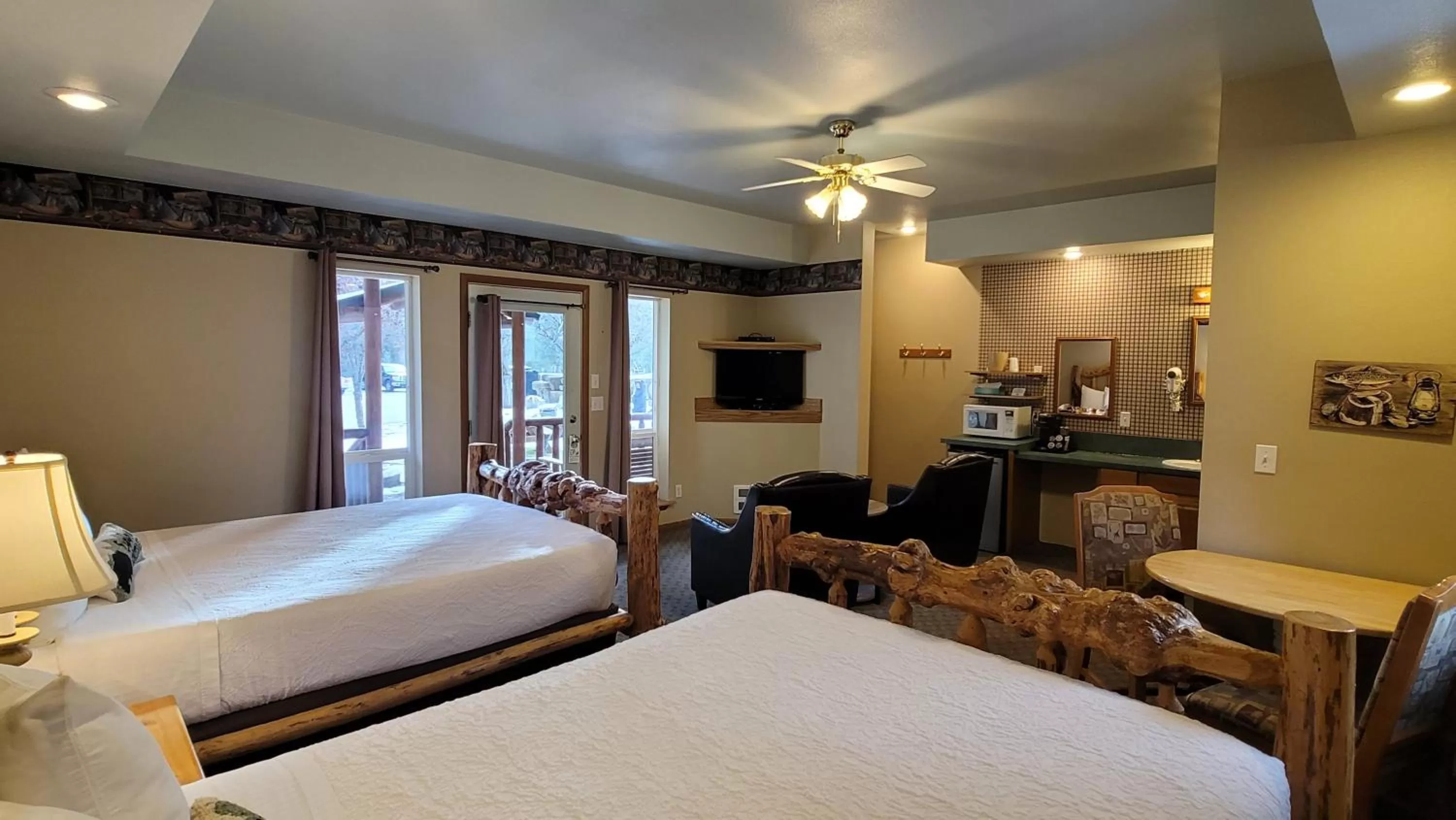 Bed in Riverfront Motel & Cabins