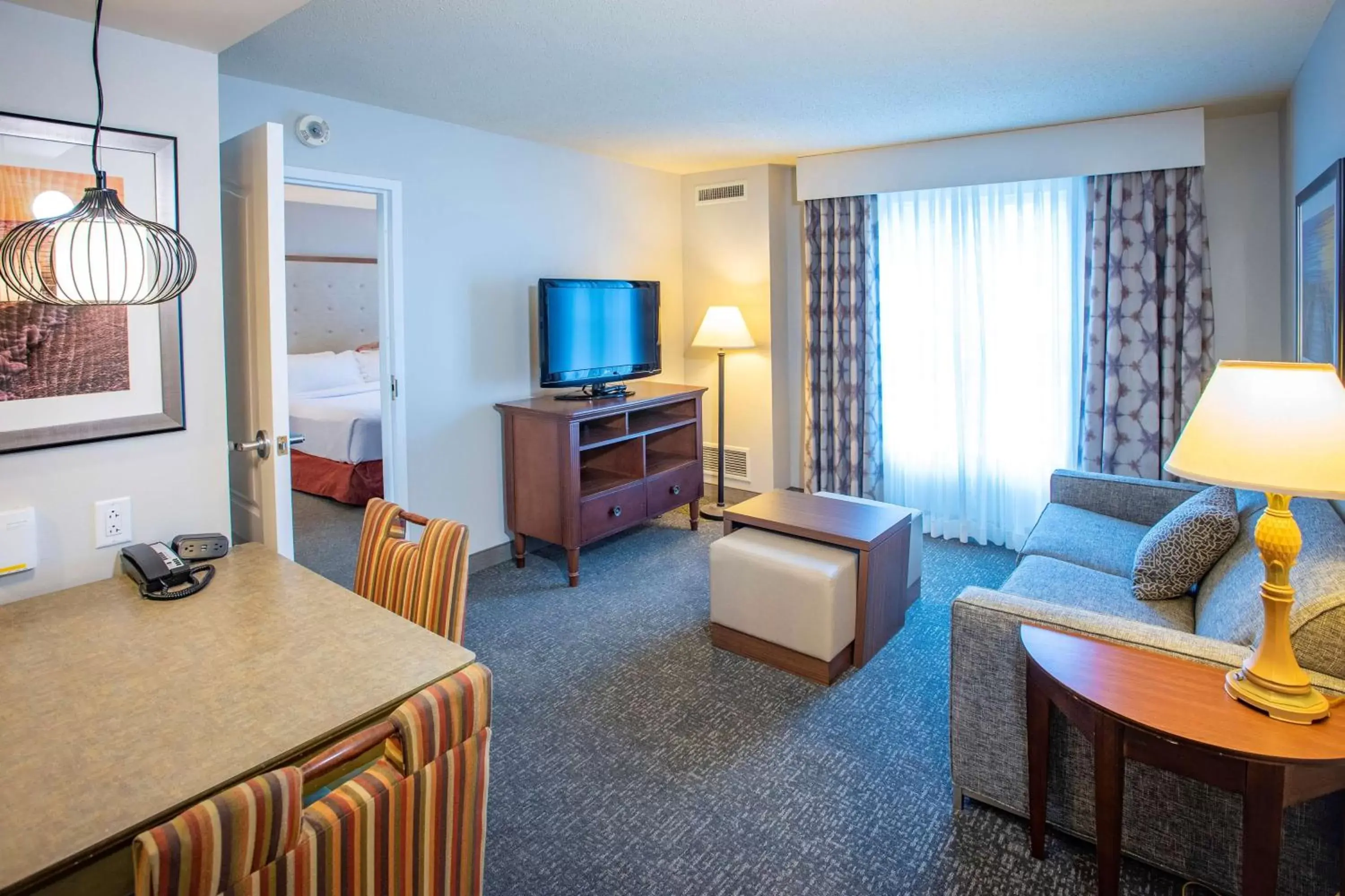 Living room, TV/Entertainment Center in Homewood Suites by Hilton Pensacola Airport-Cordova Mall Area