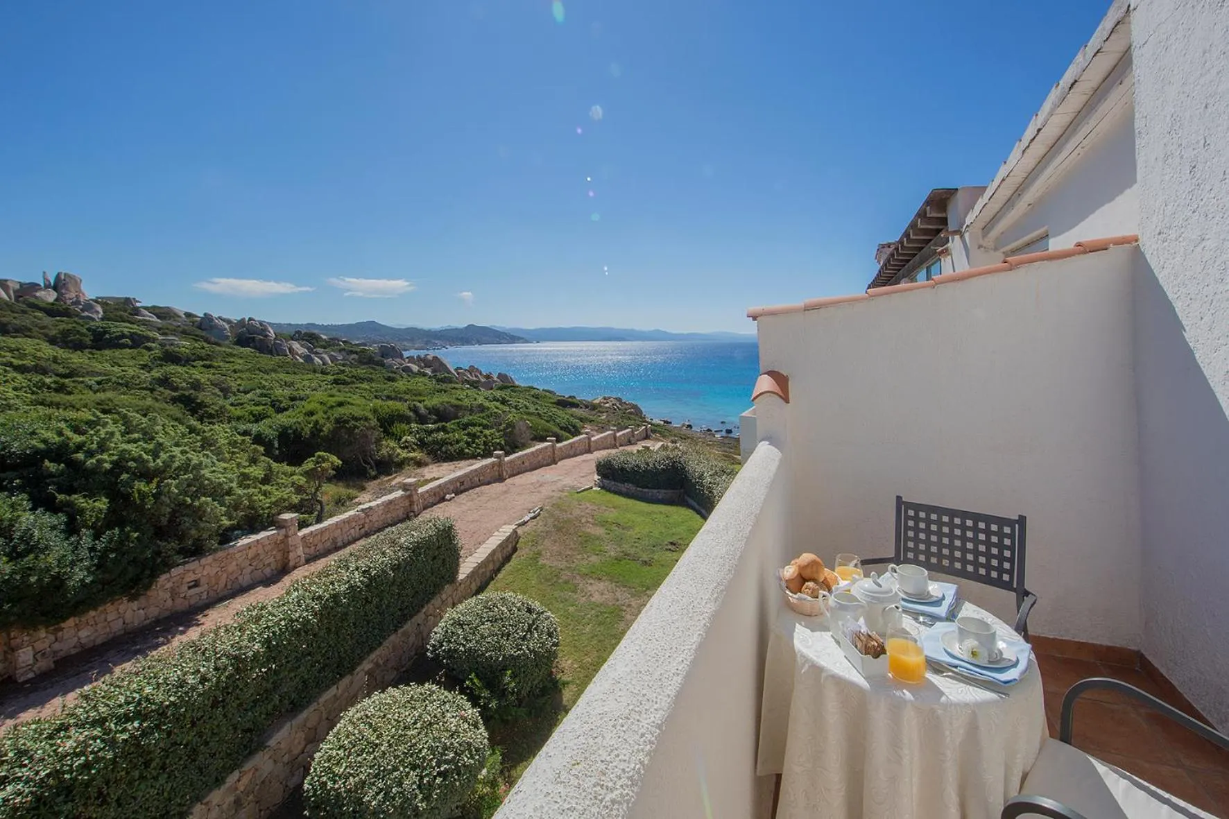 Balcony/Terrace in COLONNA GRAND HOTEL CAPO TESTA, a Colonna Luxury Beach Hotel, Santa Teresa Sardegna
