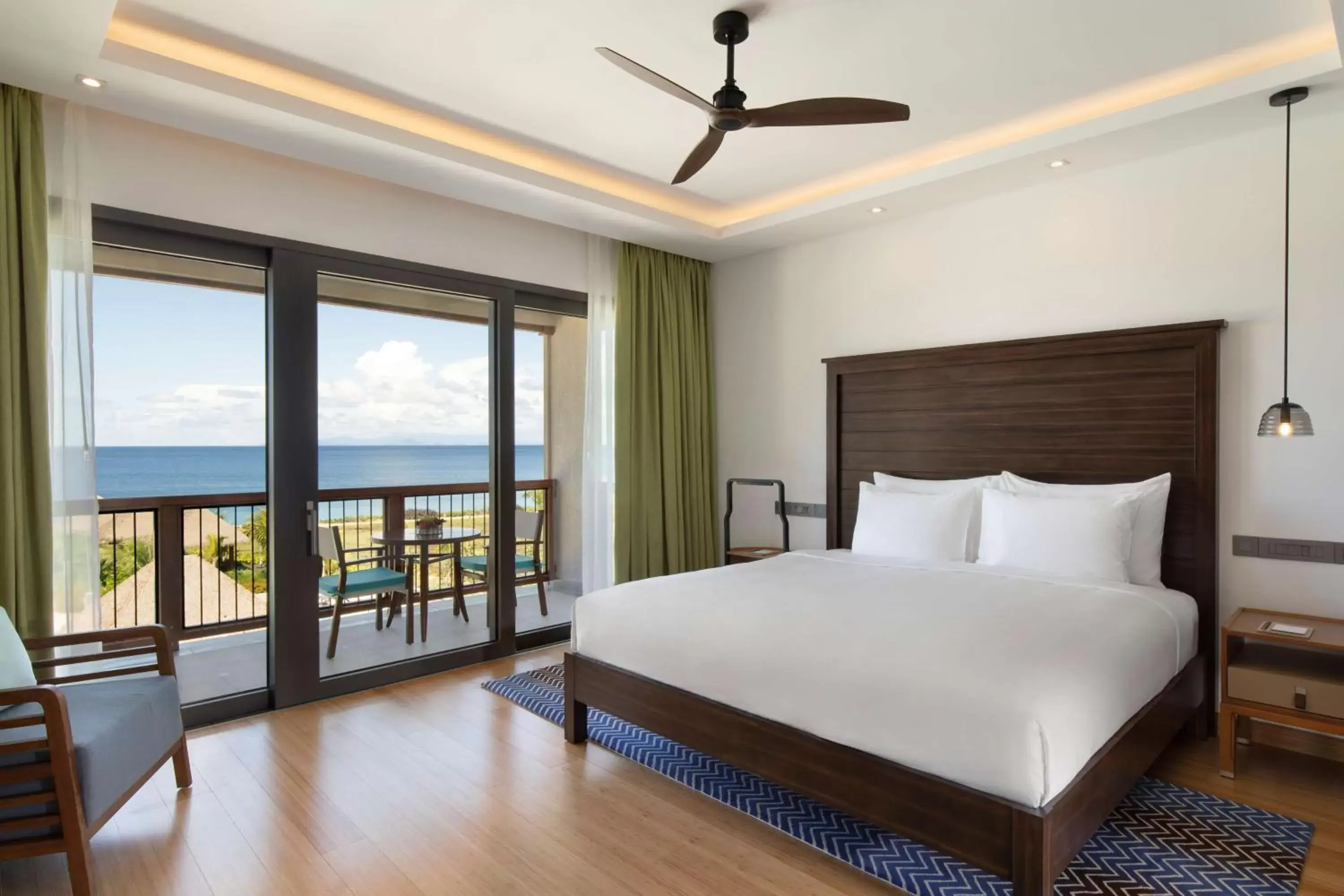 Photo of the whole room, Bed in InterContinental Dominica Cabrits Resort & Spa, an IHG Hotel