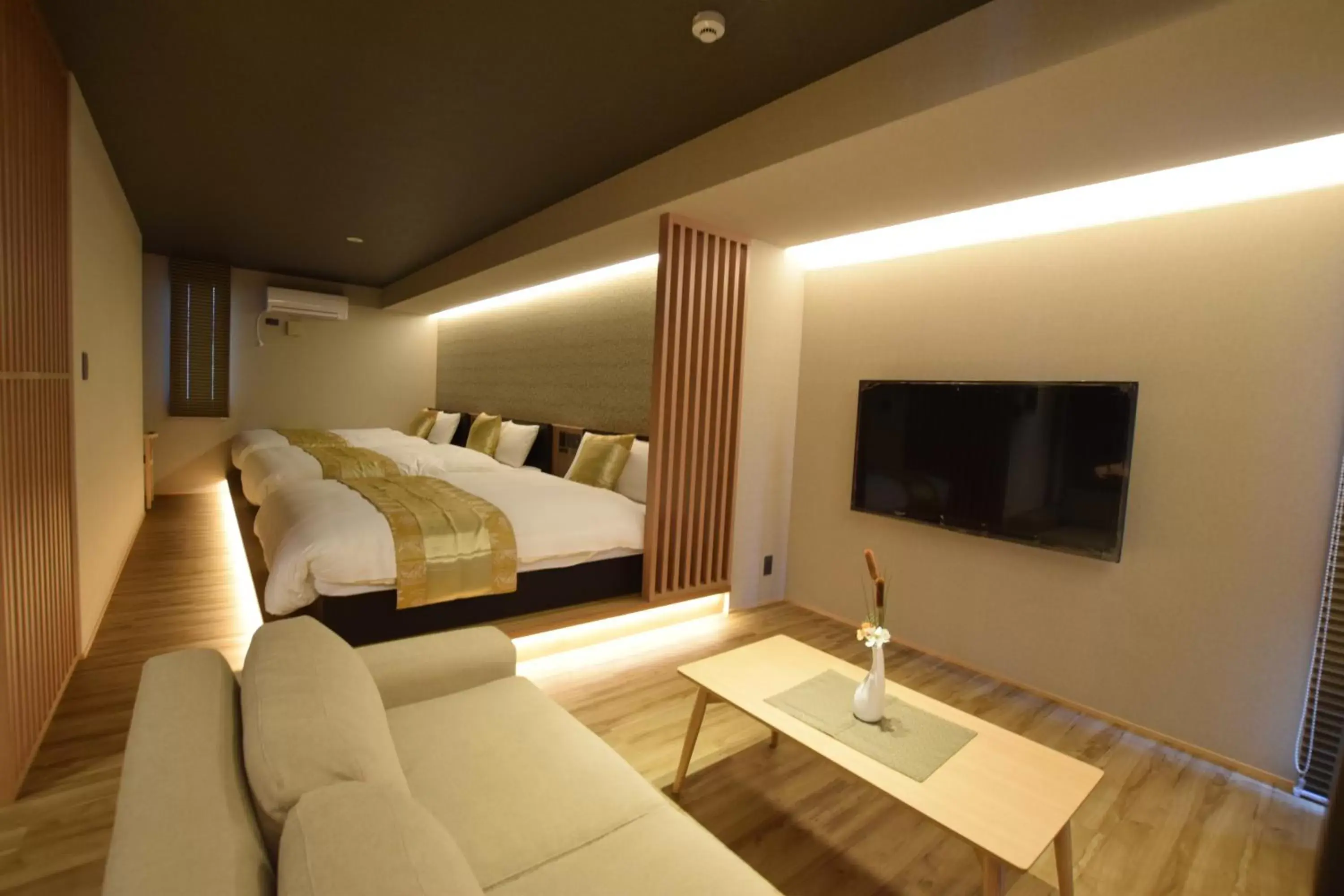 Photo of the whole room, TV/Entertainment Center in GRAND BASE Beppu Ekimae