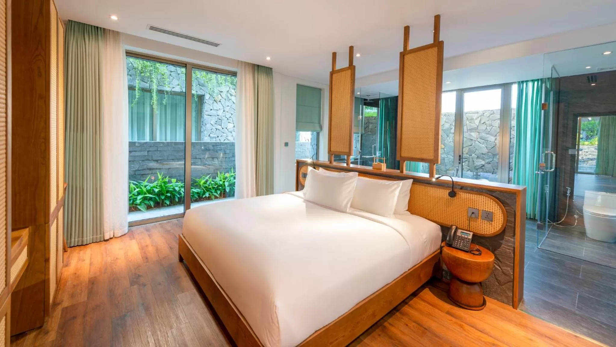 Bed in Bellerive Hoi An Resort and Spa