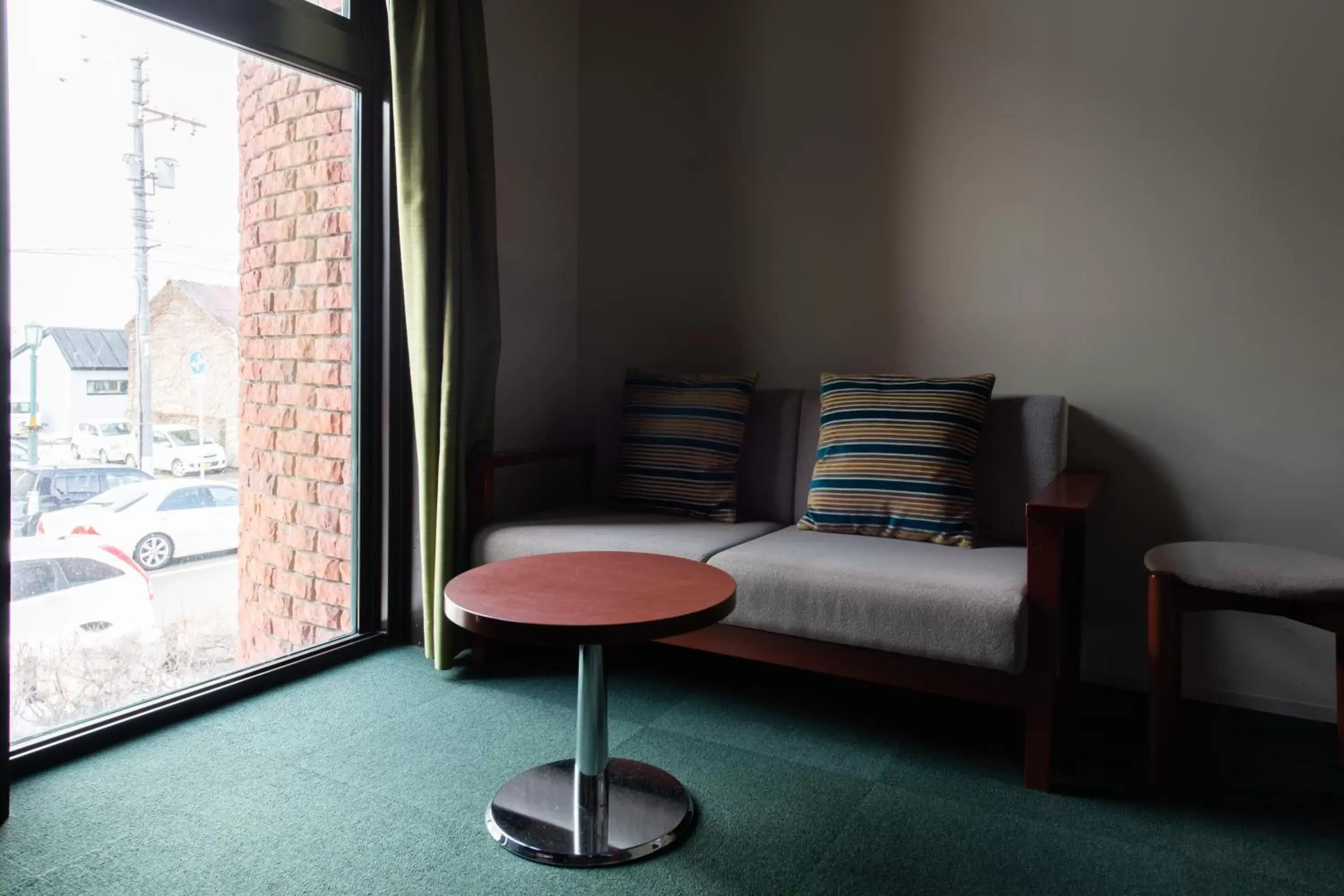 Photo of the whole room, Seating Area in HakoBA Hakodate by THE SHARE HOTELS