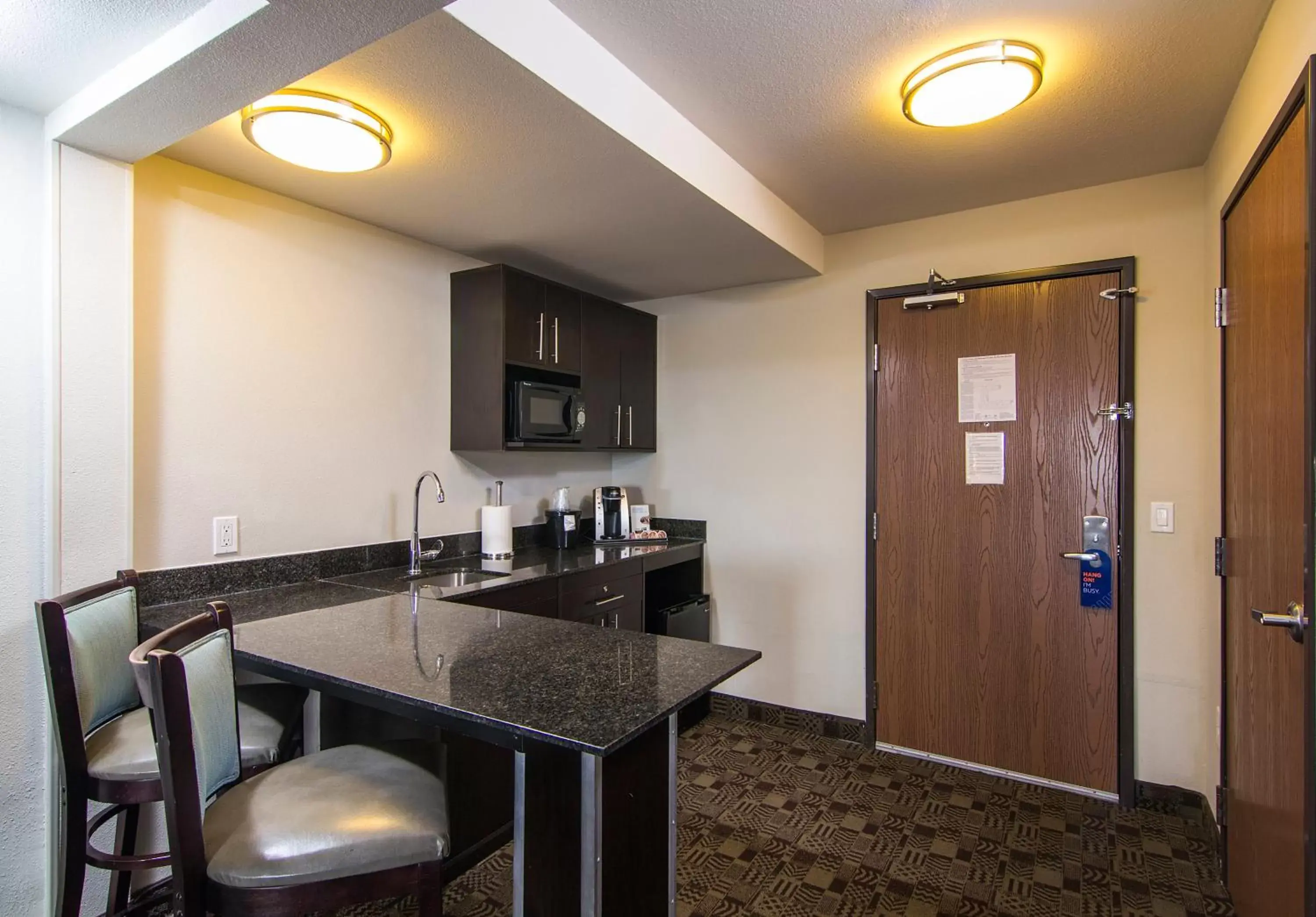 Photo of the whole room, Kitchen/Kitchenette in Holiday Inn Express Hotel & Suites Carlsbad Beach, an IHG Hotel