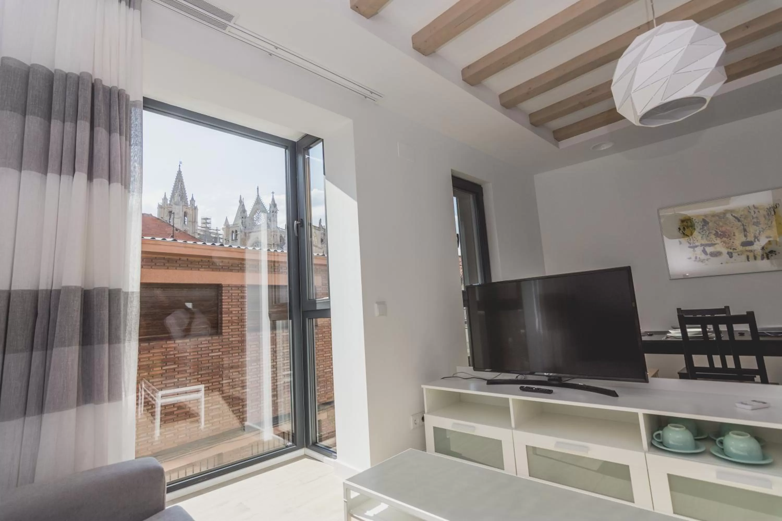 TV and multimedia in Slow León Apartamentos Turísticos