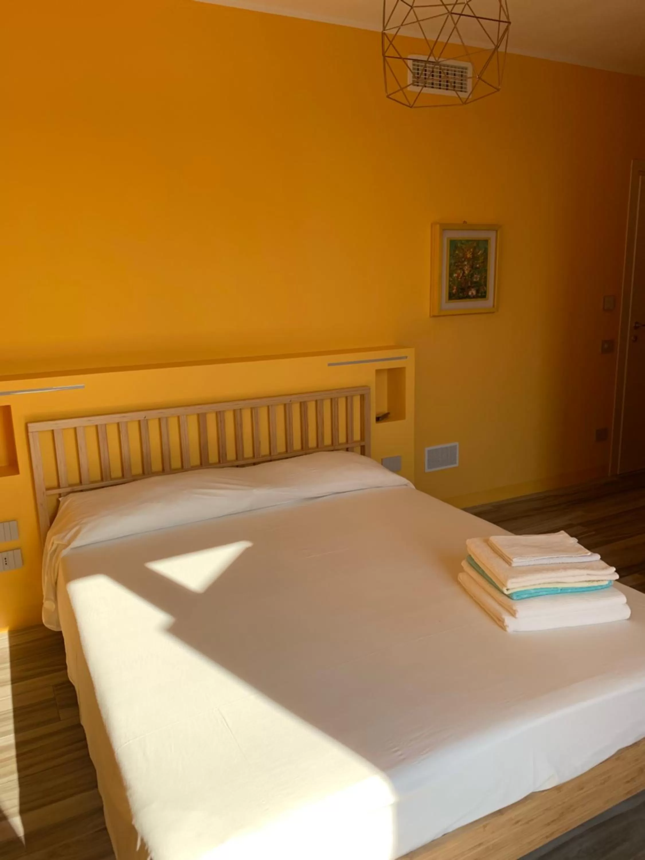 Bed in Sala dell Estate Guest House