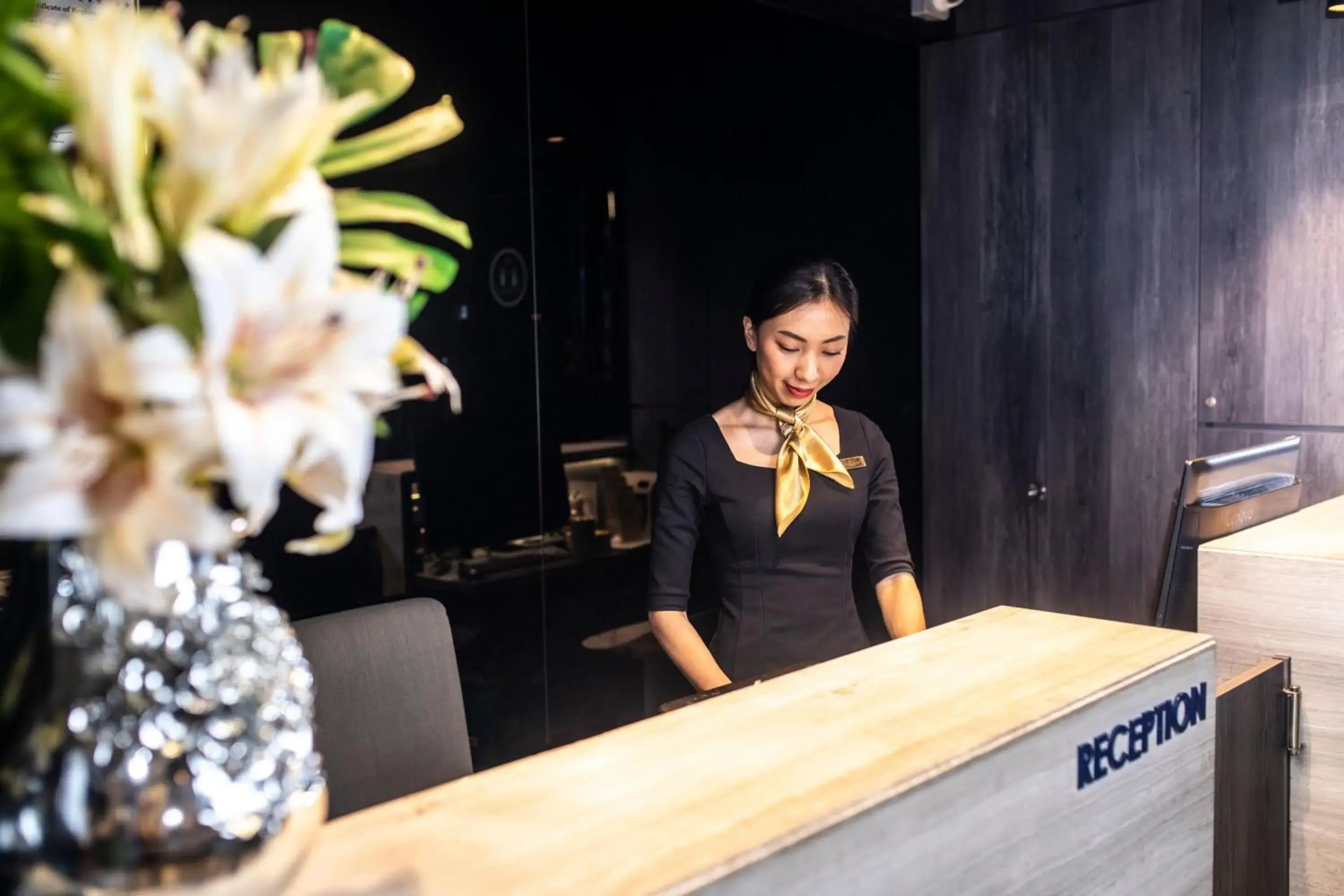 Staff in Cube Boutique Capsule Hotel @ Chinatown