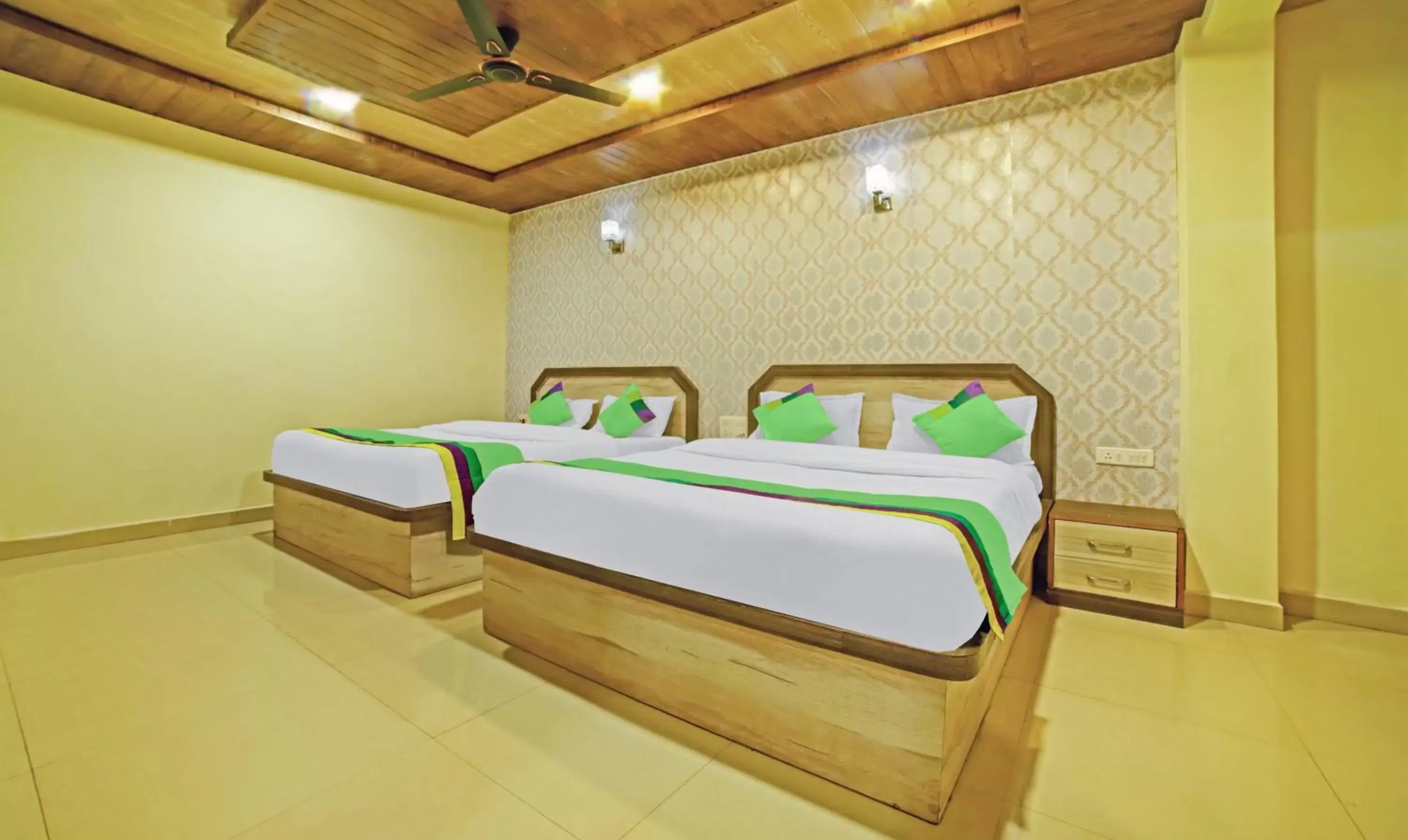Bedroom, Bed in Treebo Balaji Excellency with Pool & Spa Bedroom, Bed in Treebo Balaji Excellency with Pool & Spa