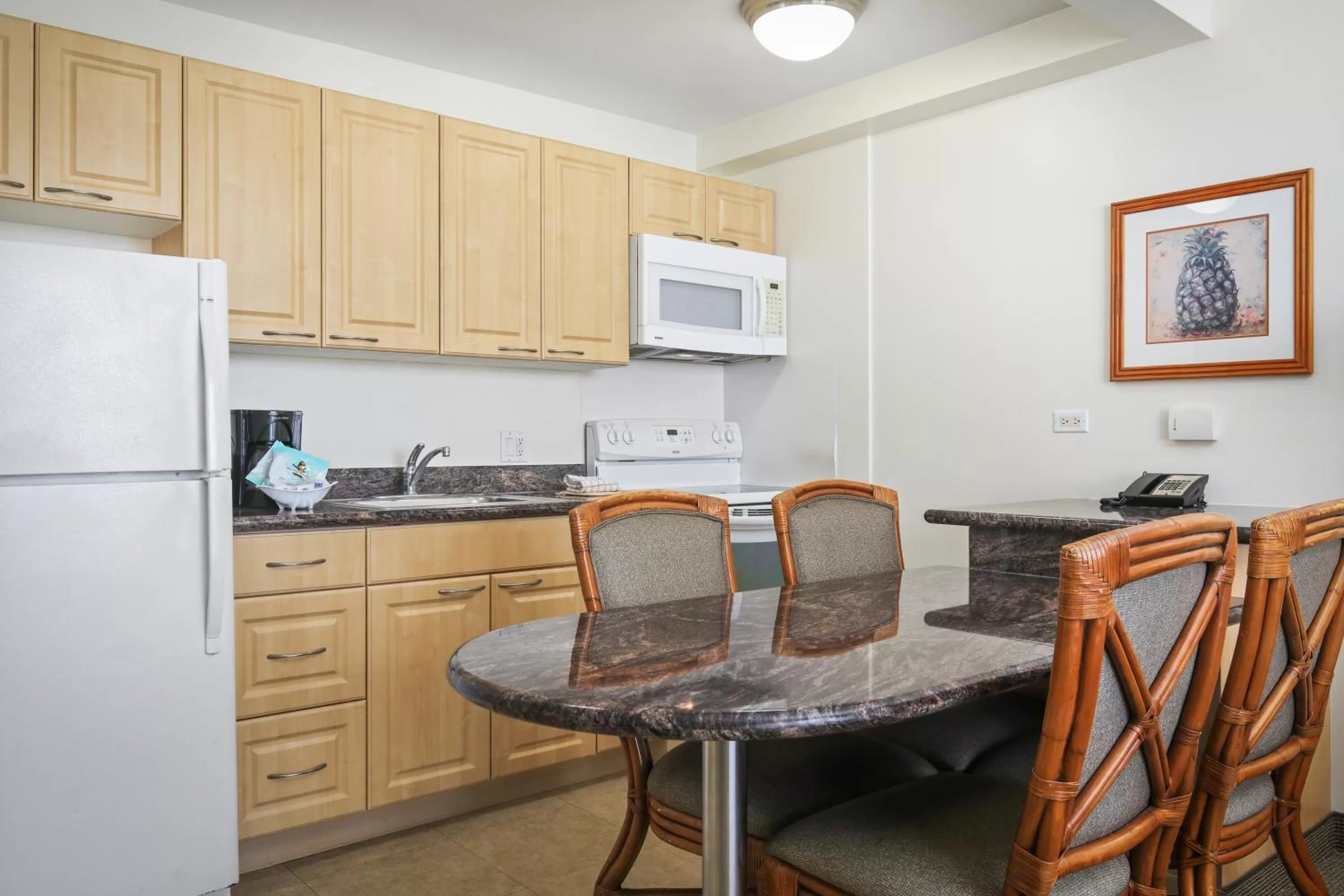 Kitchen or kitchenette in Aston Waikiki Sunset