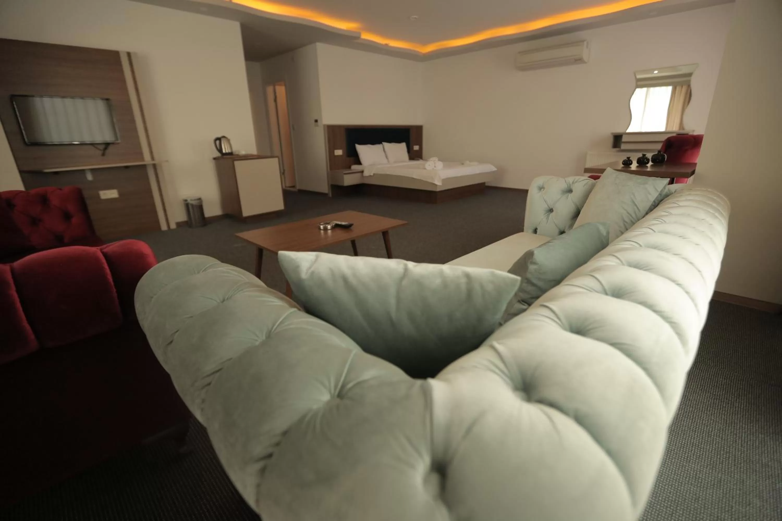 Bed in TEVETOGLU HOTEL