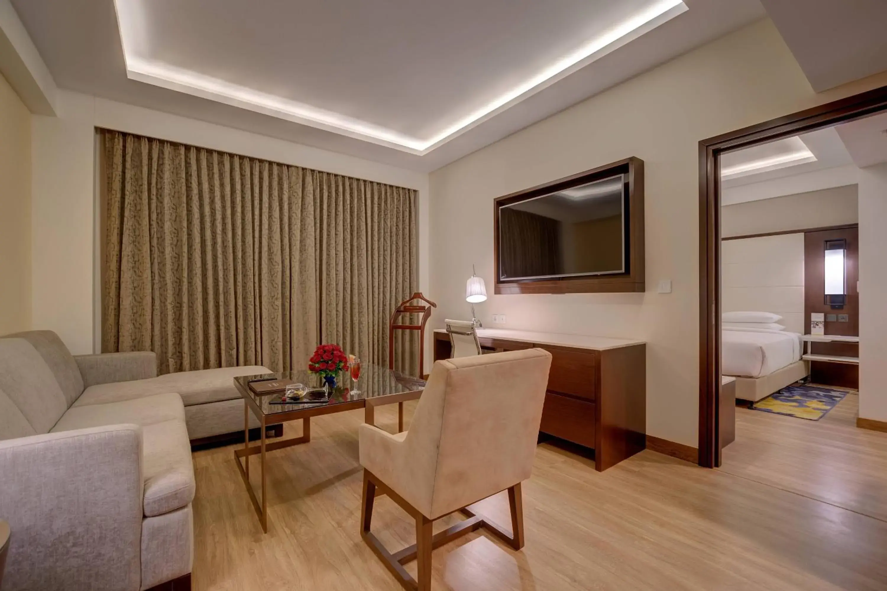 Living room, Seating Area in Courtyard by Marriott Surat