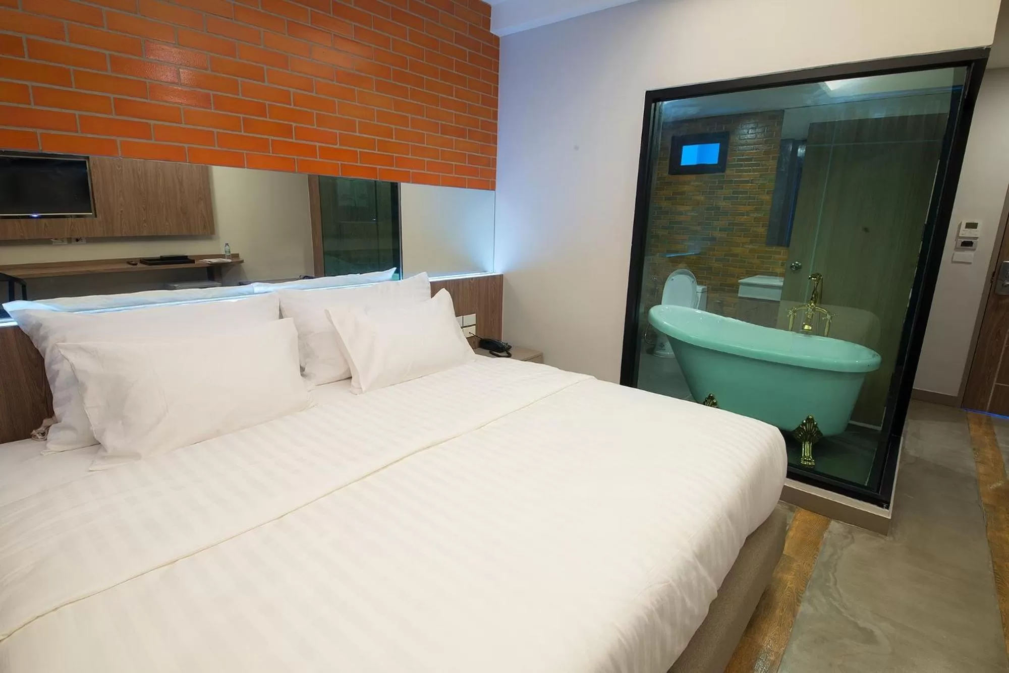Photo of the whole room, Bed in V20 Boutique Jacuzzi Hotel