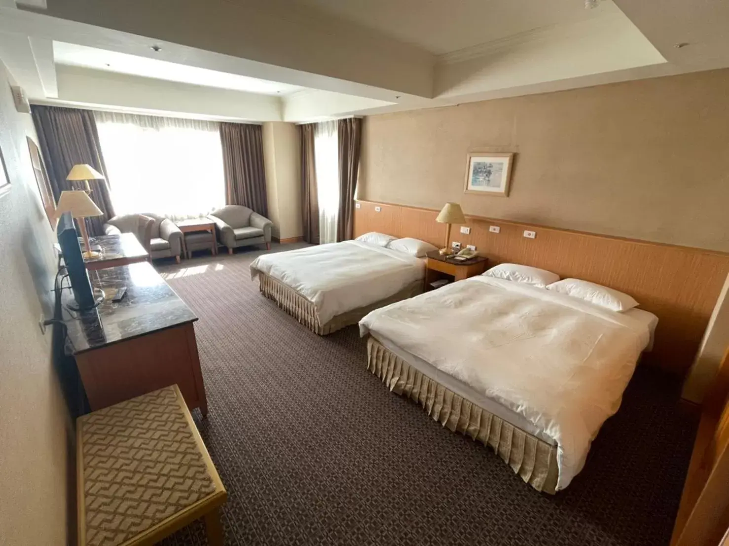 Bed in Chuto Plaza Hotel
