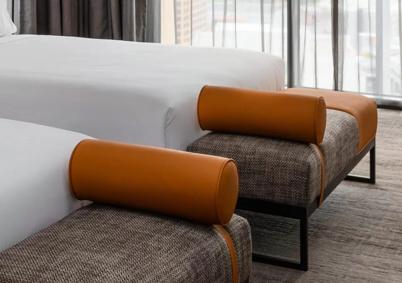 Seating area, Bed in Mövenpick Hotel Hobart