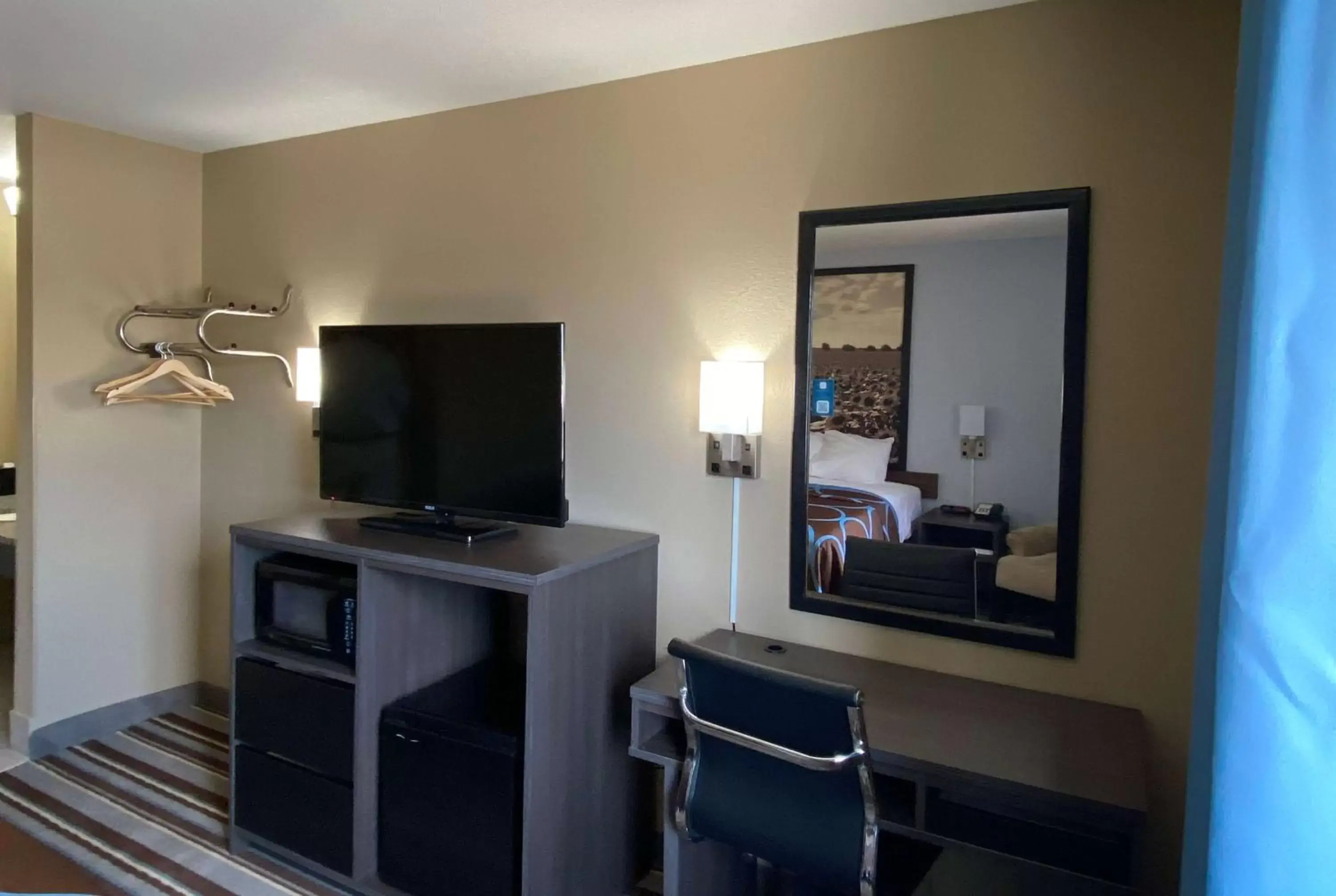 Photo of the whole room, TV/Entertainment Center in Super 8 by Wyndham Independence