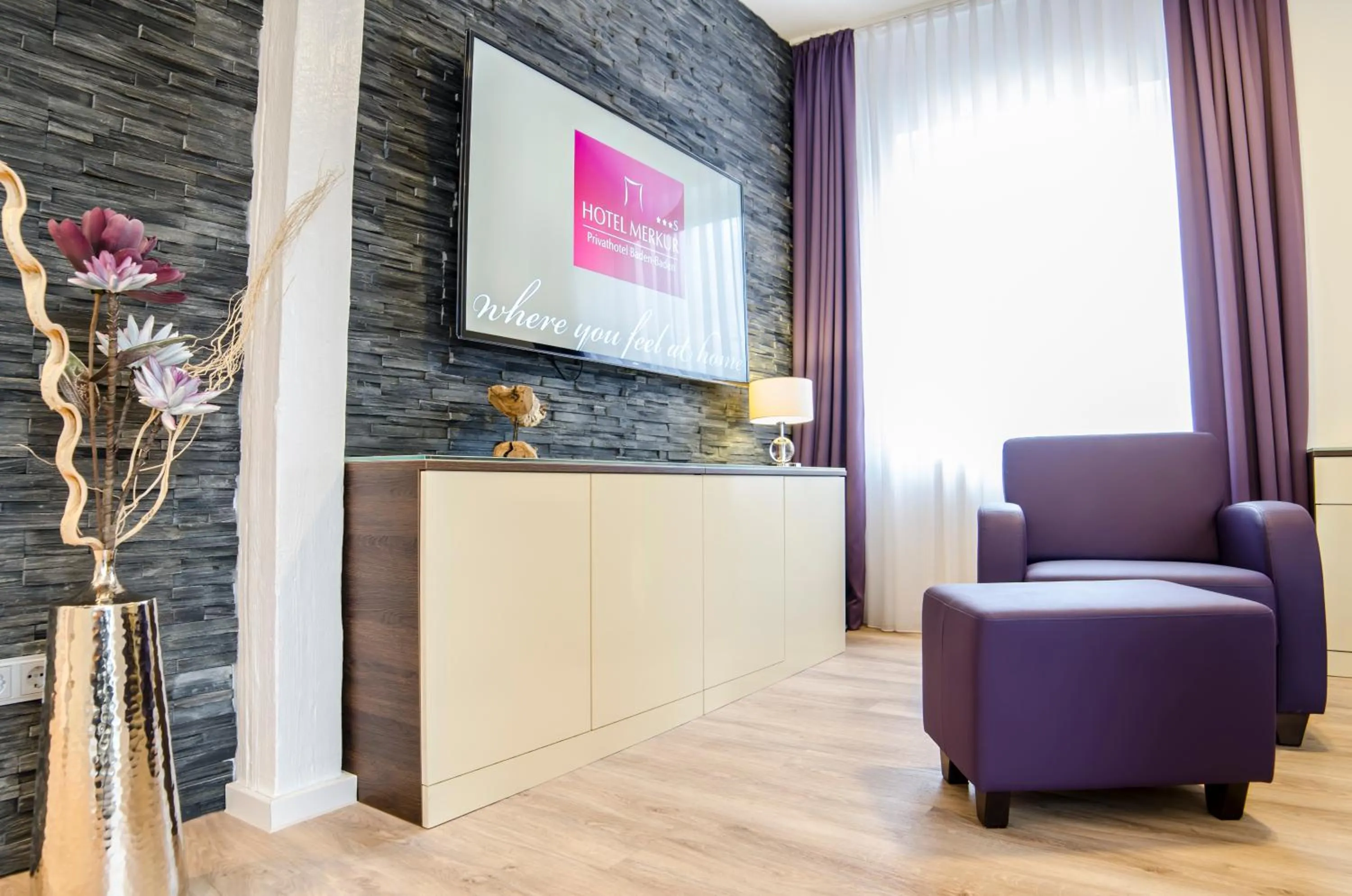 Photo of the whole room in Hotel Merkur - Superior